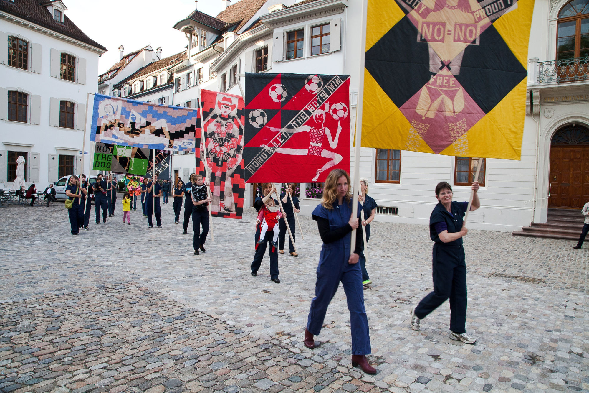 Installation view of Lara Schnitger's show at Basel Parcours, featuring a large body of works as well as a procession through Mezzeplatz. Multiple works featured.