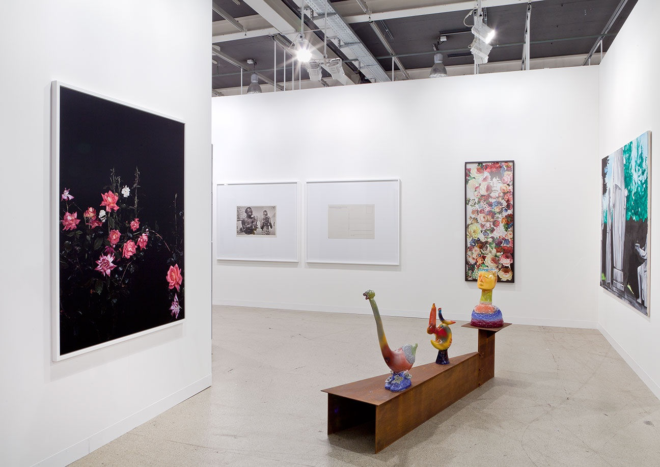 Installation view of Anton Kern Gallery's booth at Basel 2014. Sarah Jones, Pessoli, Anne Collier, and Jim Lambie represented.