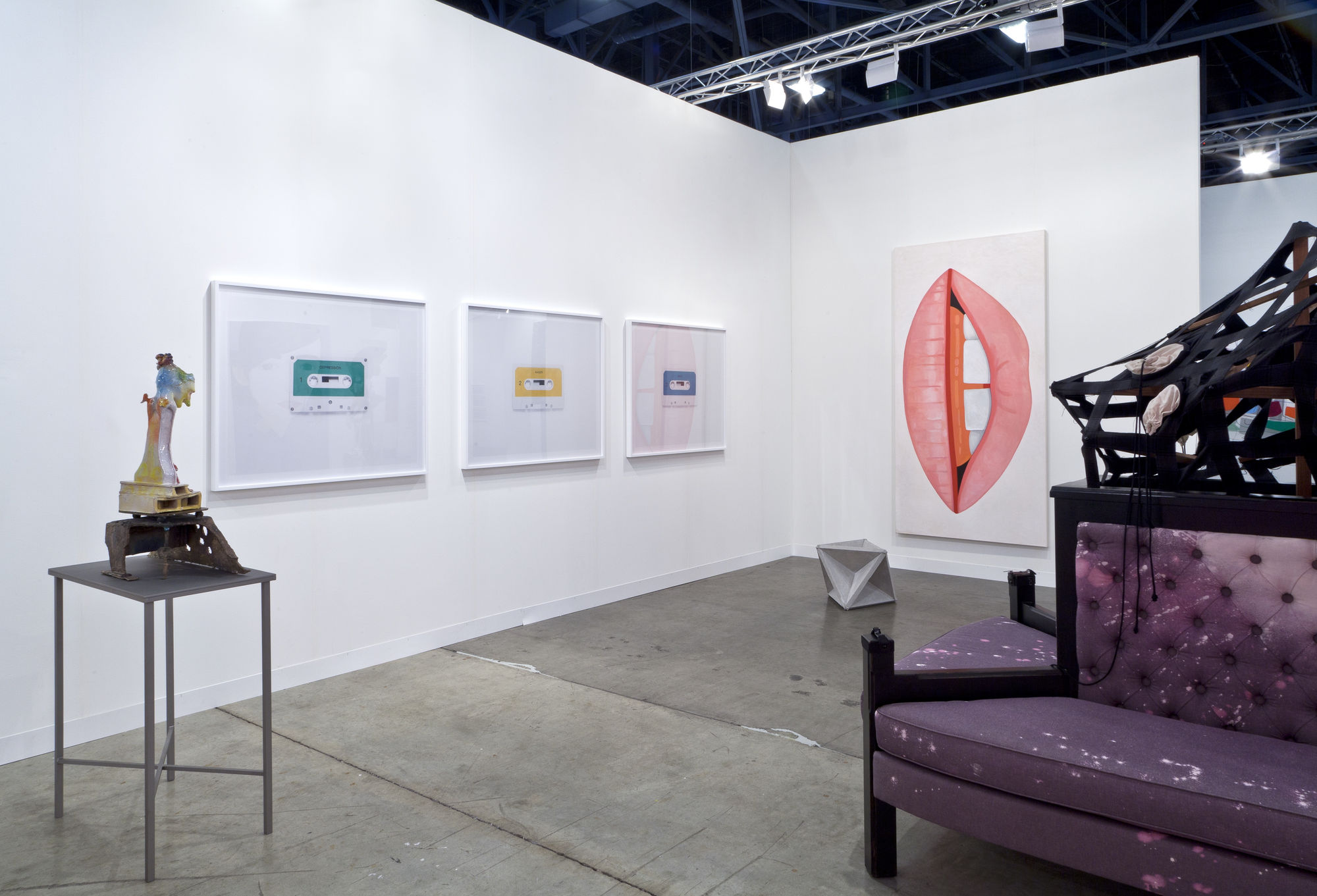Installation view of the AKG booth at Art Basel Miami 2014. Collier and Calvin featured.