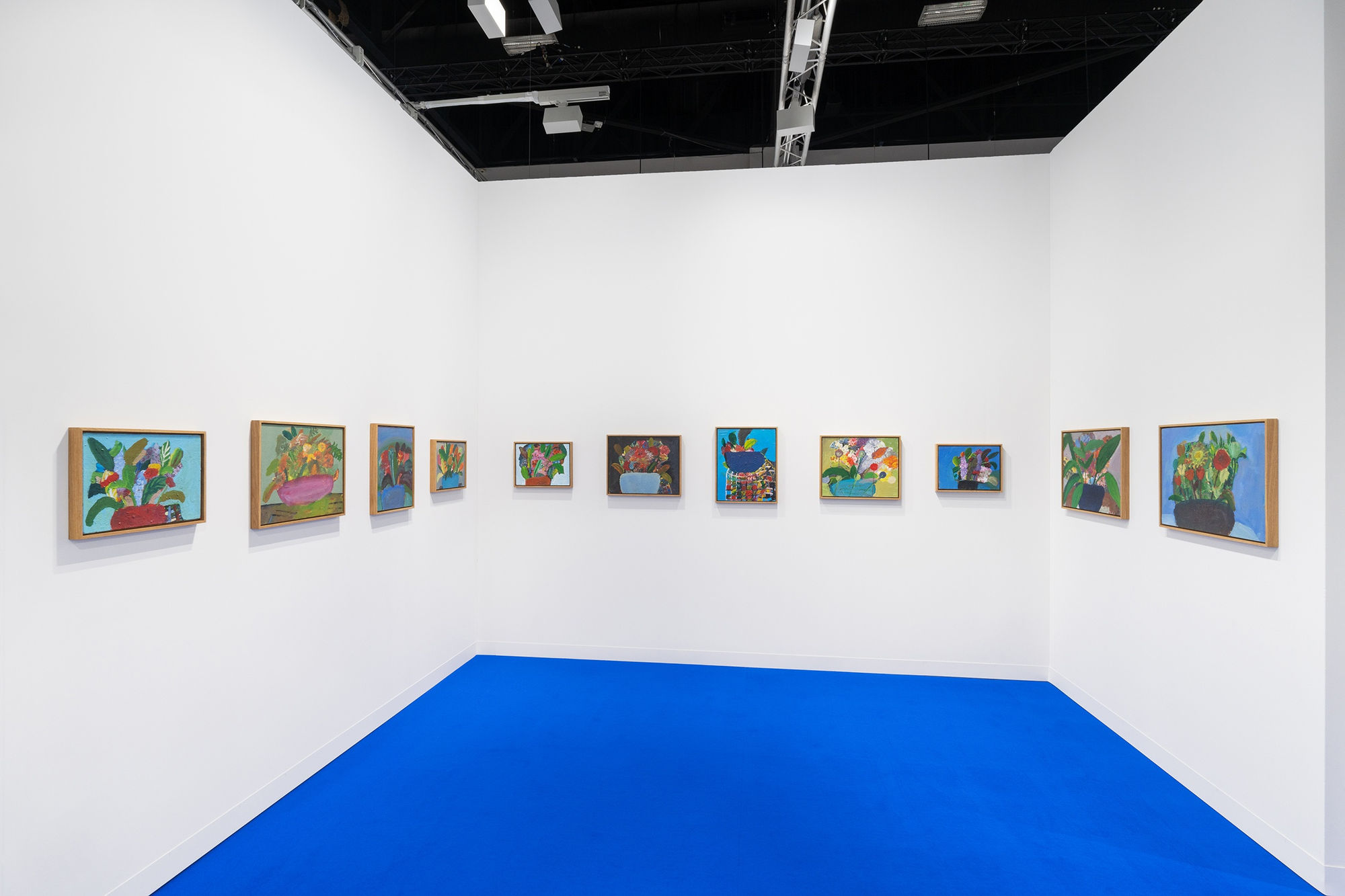 Installation view of Art Basel Kabinett 2022 with view of floors, walls, and artworks by Margot Bergman.