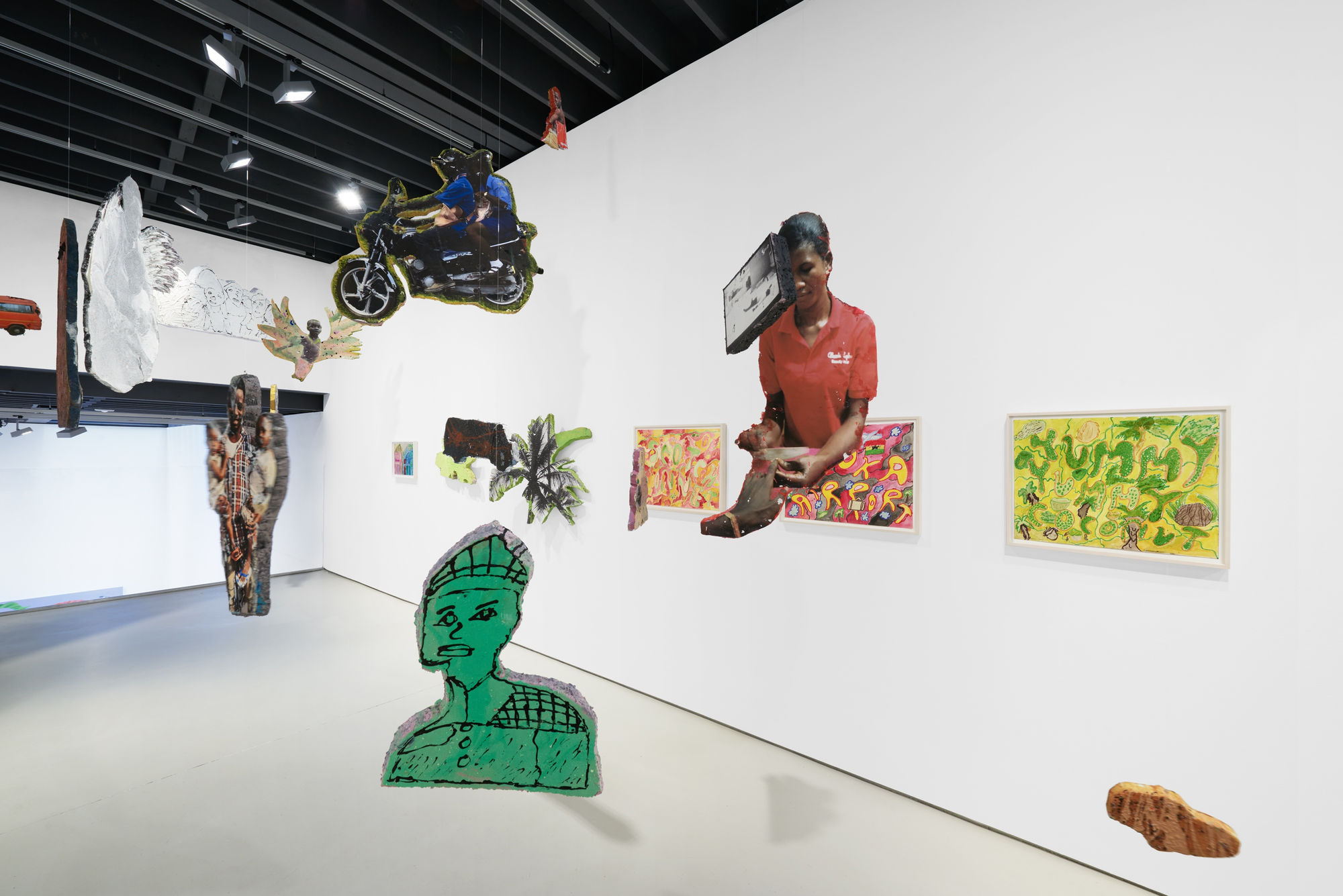 Installation view of the 2023 exhibition “Lloyd Foster: Double Double” with view of white floors, walls, artworks and ceiling.