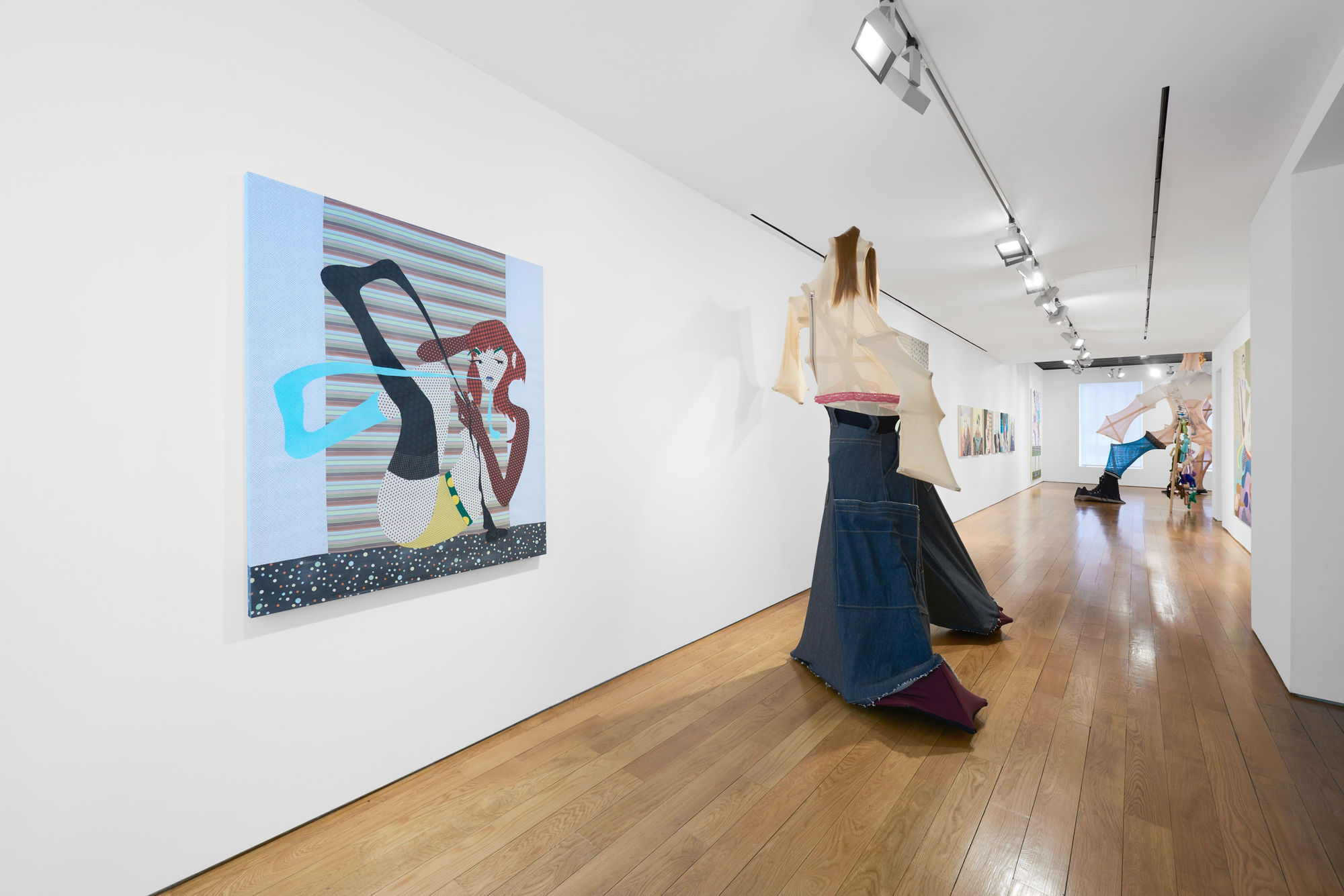 Installation view of the 2023 exhibition “Lara Schnitger: 10 Feet High and Rising” with view of wood floors, walls, artworks and ceiling.