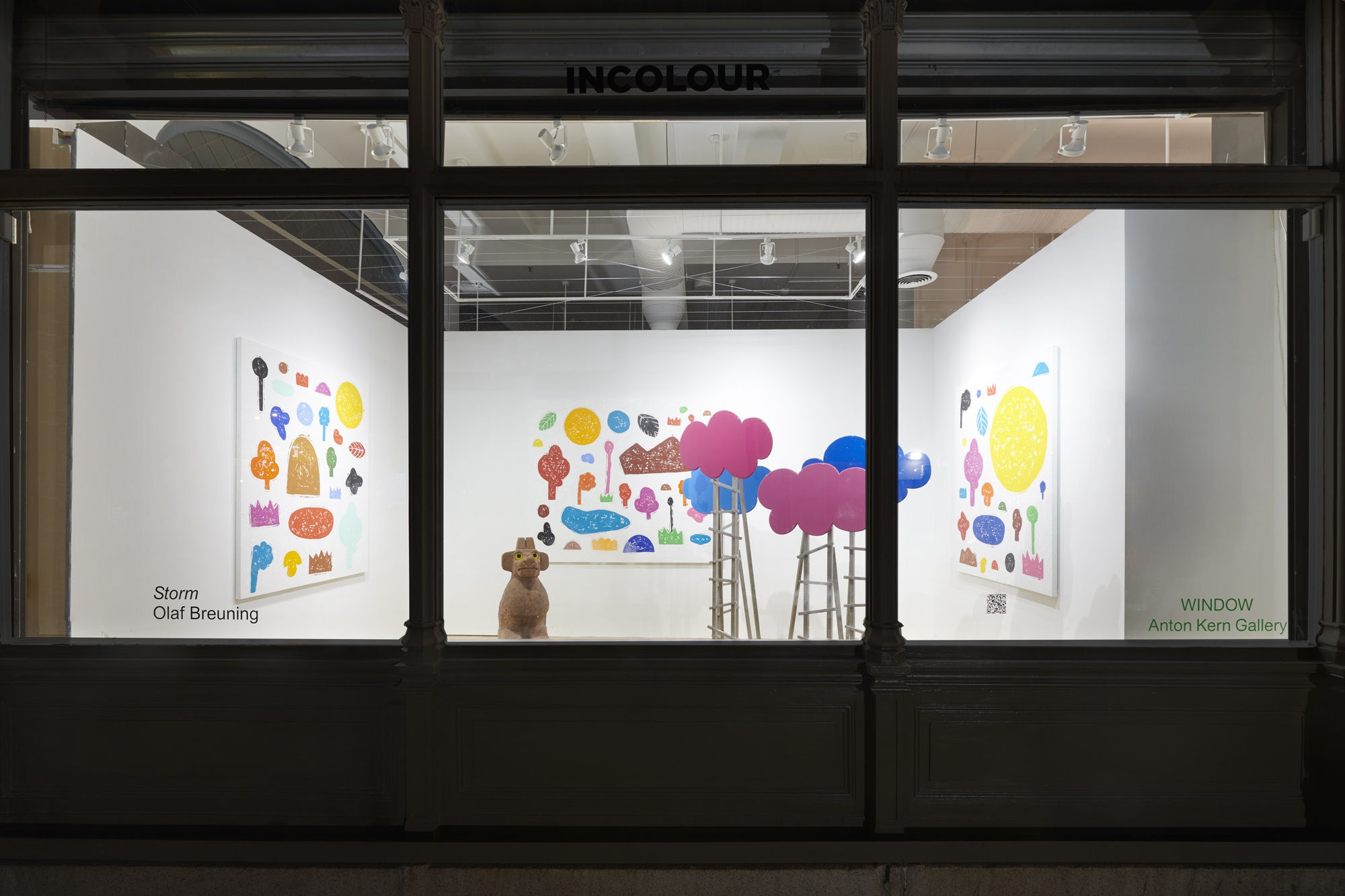 Installation view of the 2023 exhibition “Olaf Breuning: Storm” with exterior view of wood floors, walls, artworks and ceiling.