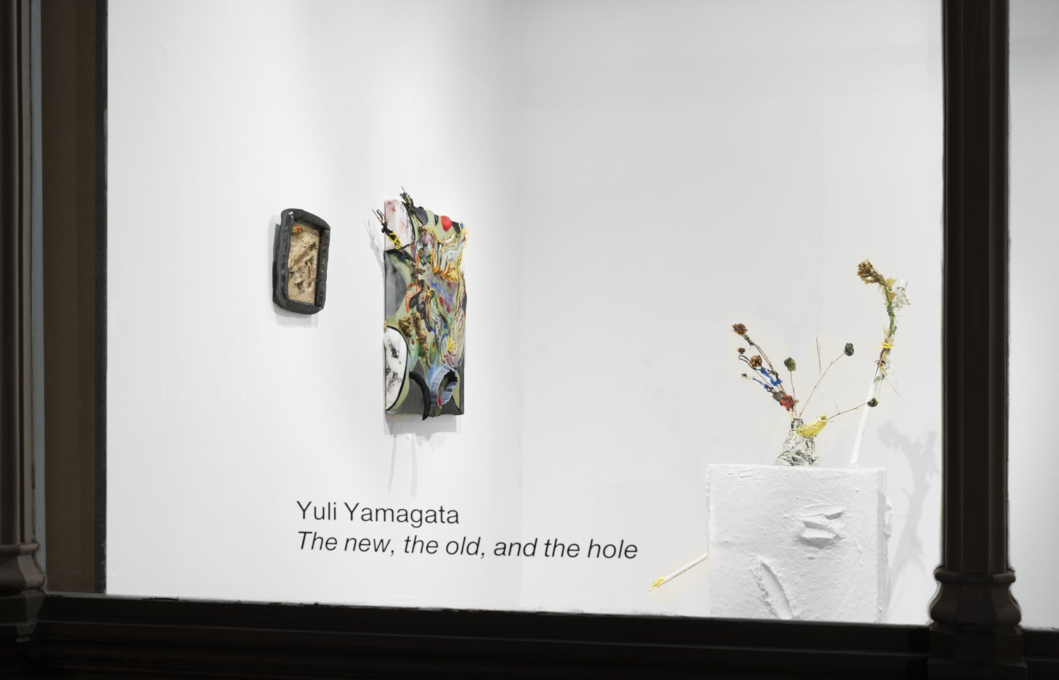 Installation view of the 2023 exhibition “Yuli Yamagata: The new, the old, and the hole” with exterior view of walls, artworks and ceiling.