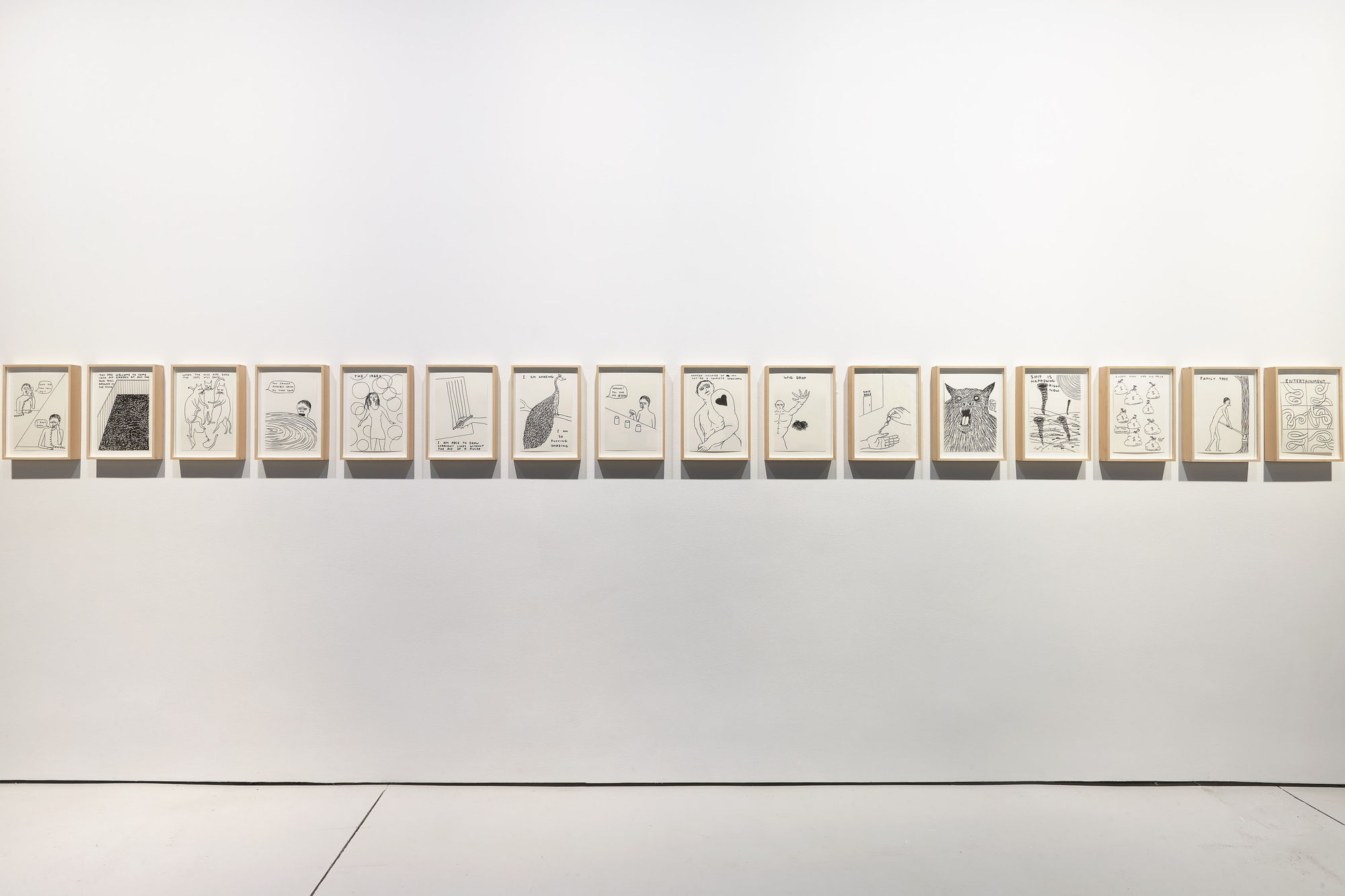 Installation view of David Shrigley's solo exhibition at the gallery with about 100 paintings and sculptures. Smaller works presented.