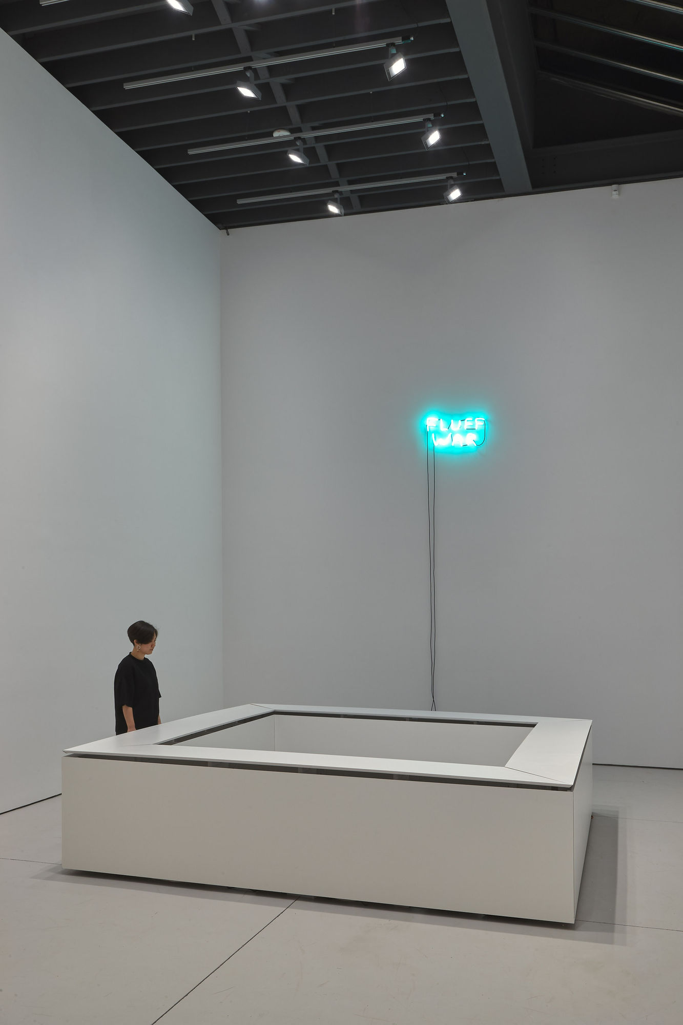 Installation view of David Shrigley's solo exhibition at the gallery with about 100 paintings and sculptures. Kinetic work "Fluff War" featured.