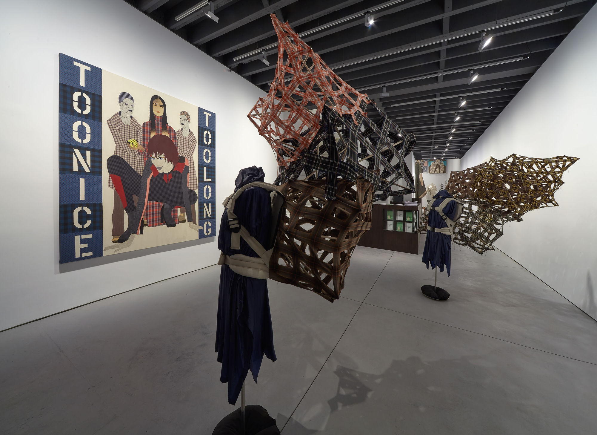 Installation view of Lara Schnitger's show Too Nice Too Long. Two sculptures and fabric work seen here.