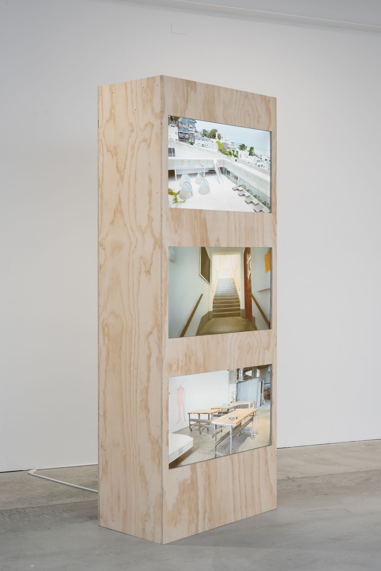 Closed for Business SFAI 2023, 2024 Wood, three-channel video 96 x 38 x 20 inches