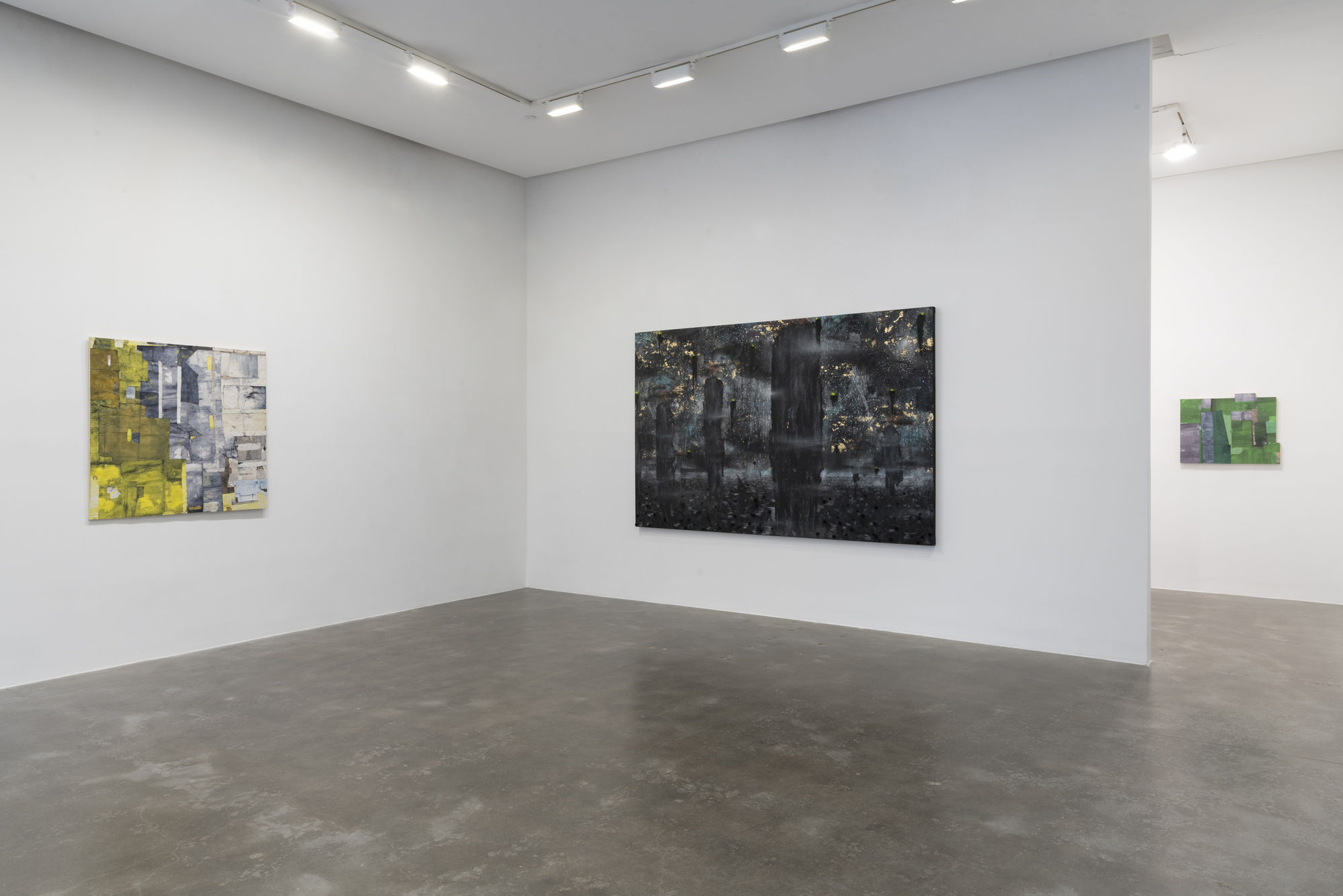 Installation view of large, dark landscape painting with two smaller quilt-like assemblages on wall