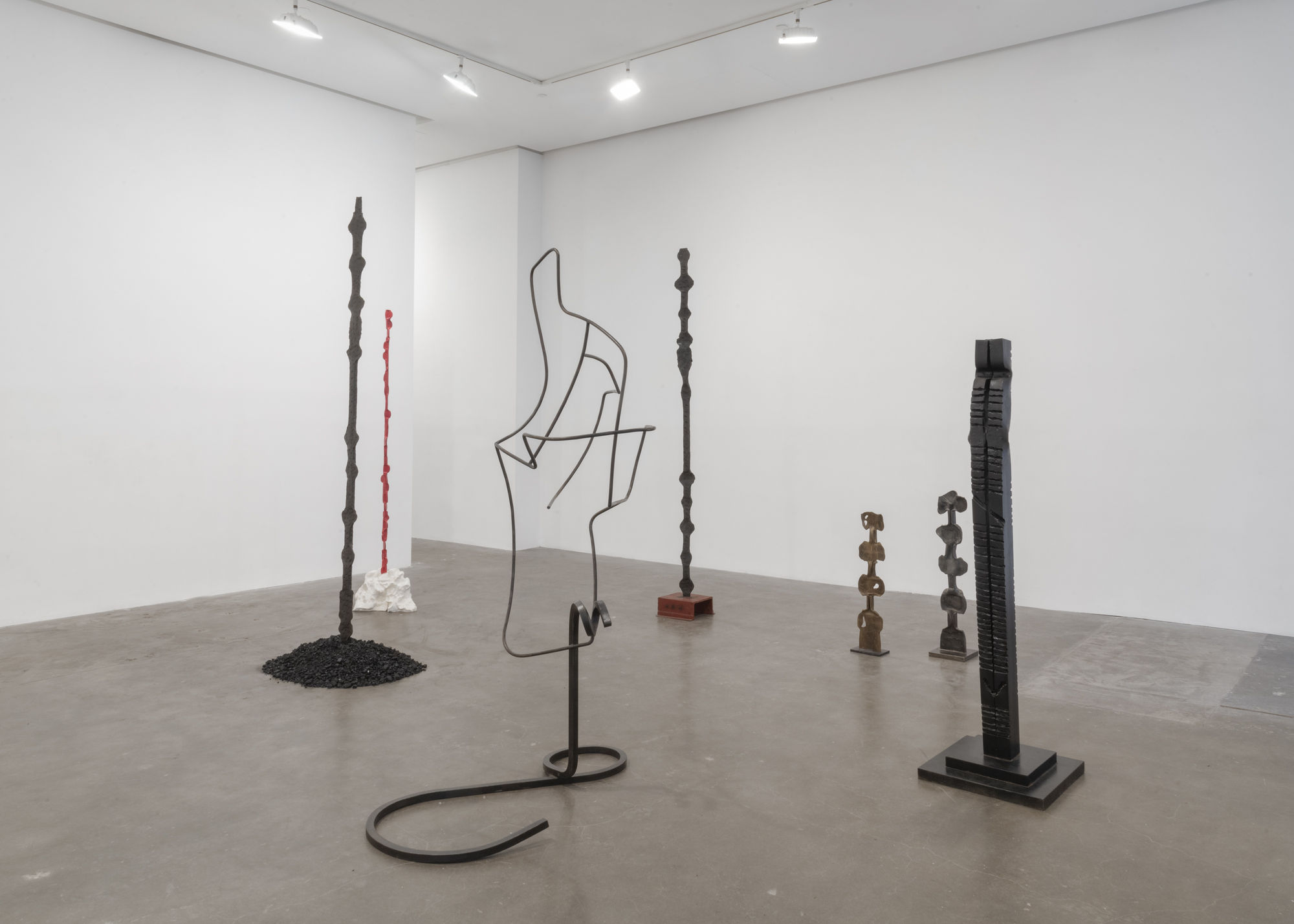 Installation view of several Kirili vertical sculptures 