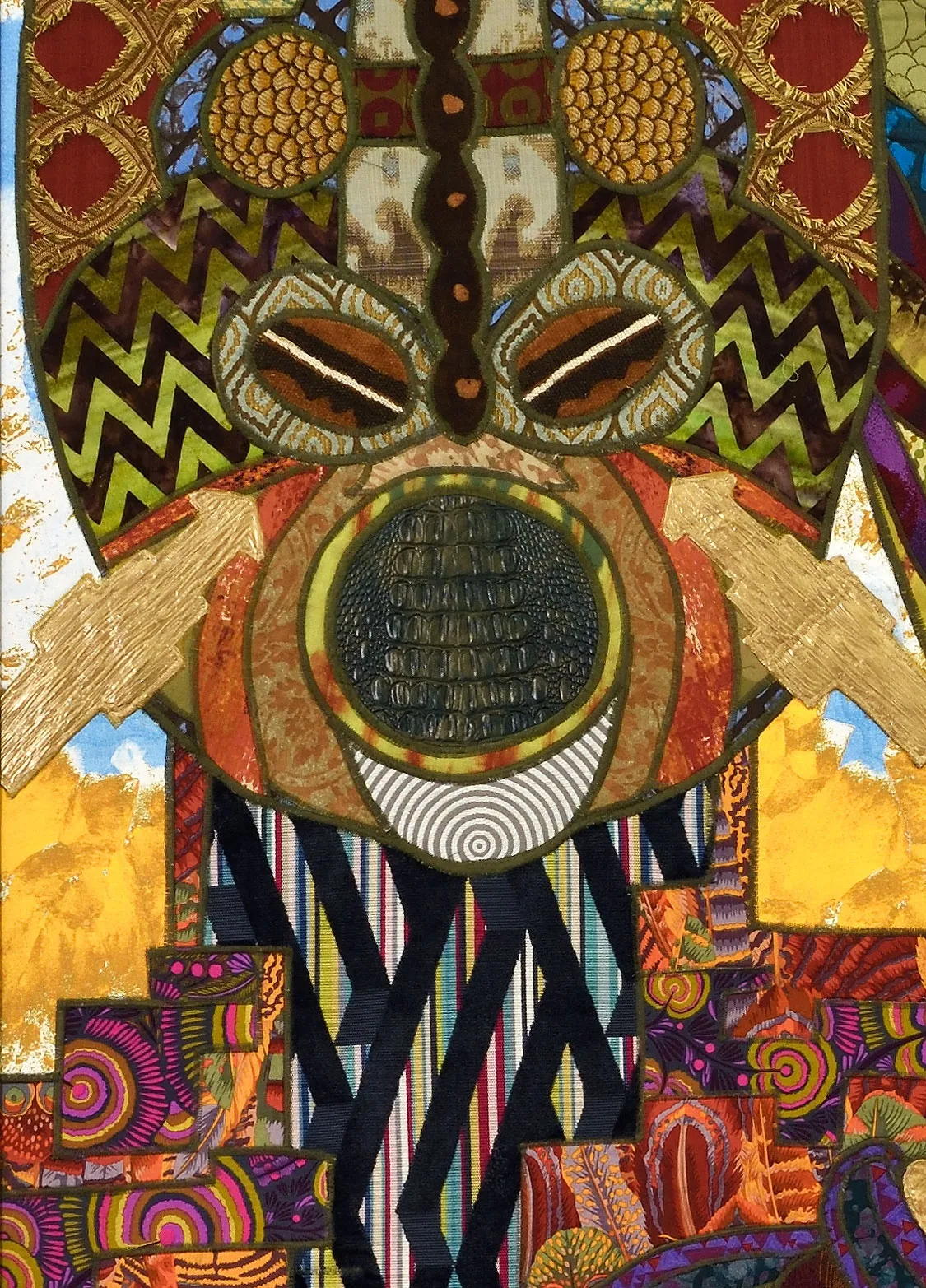 Detailed view of The Royal Court, showing one of the three mask figures.