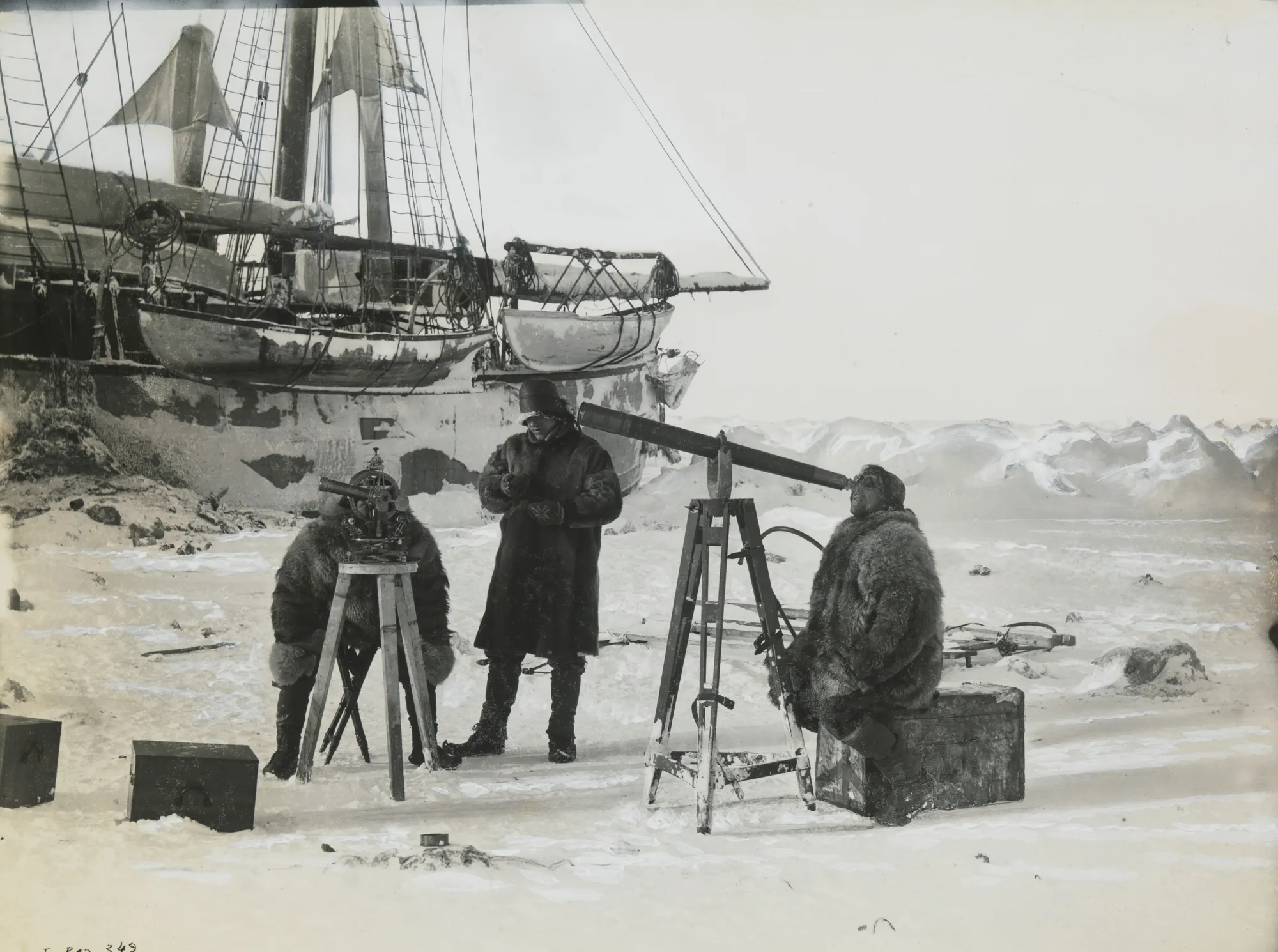 A photograph of the Norwegian explorer, biologist and humanitarian Fridtjof Nansen with his companions observing a solar eclipse on an ice sheet on 6.4.1894.