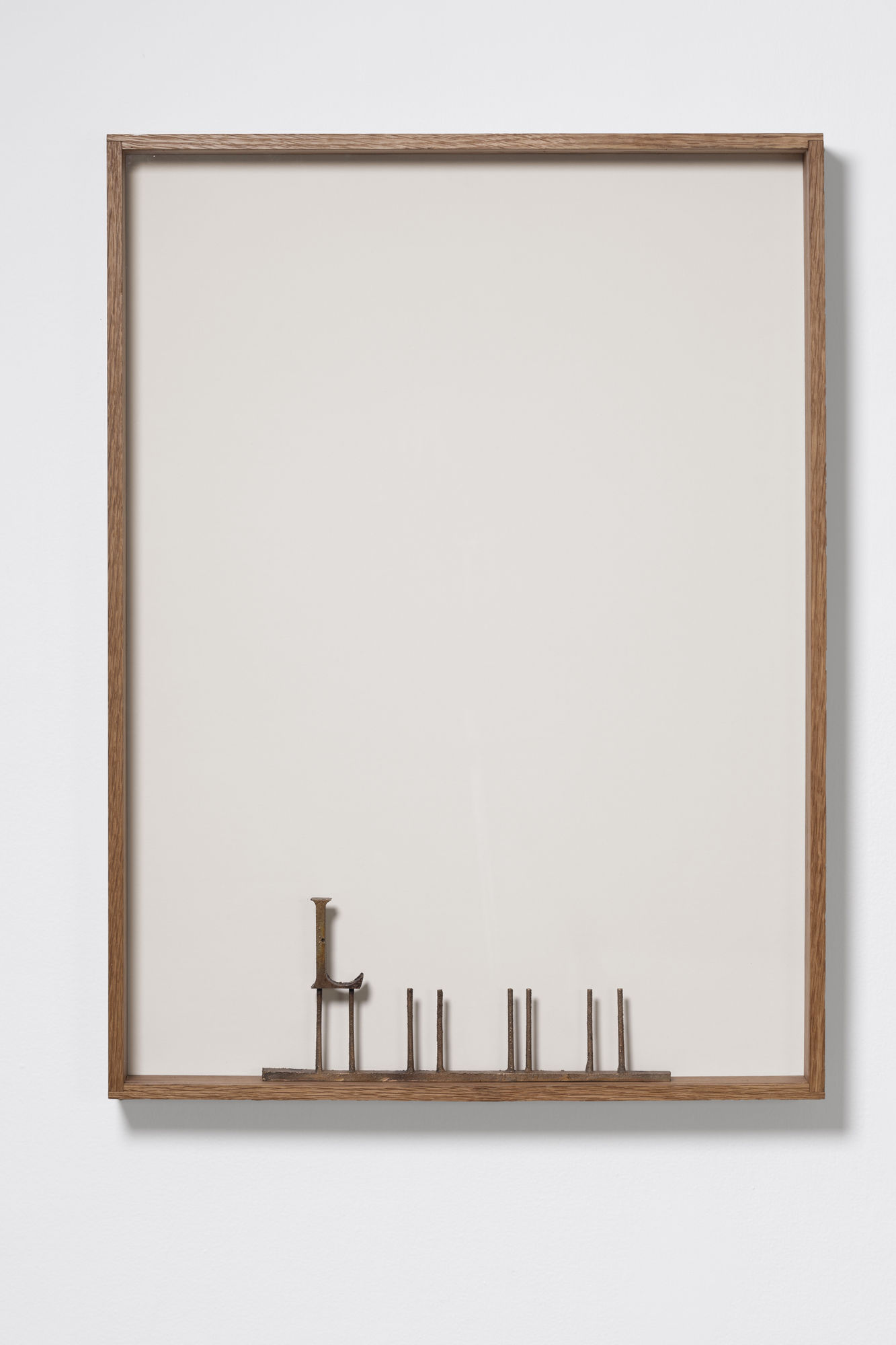 Shilpa Gupta L (LOVE) Gun metal, wood 30.5 x 22.5 x 2.5 in