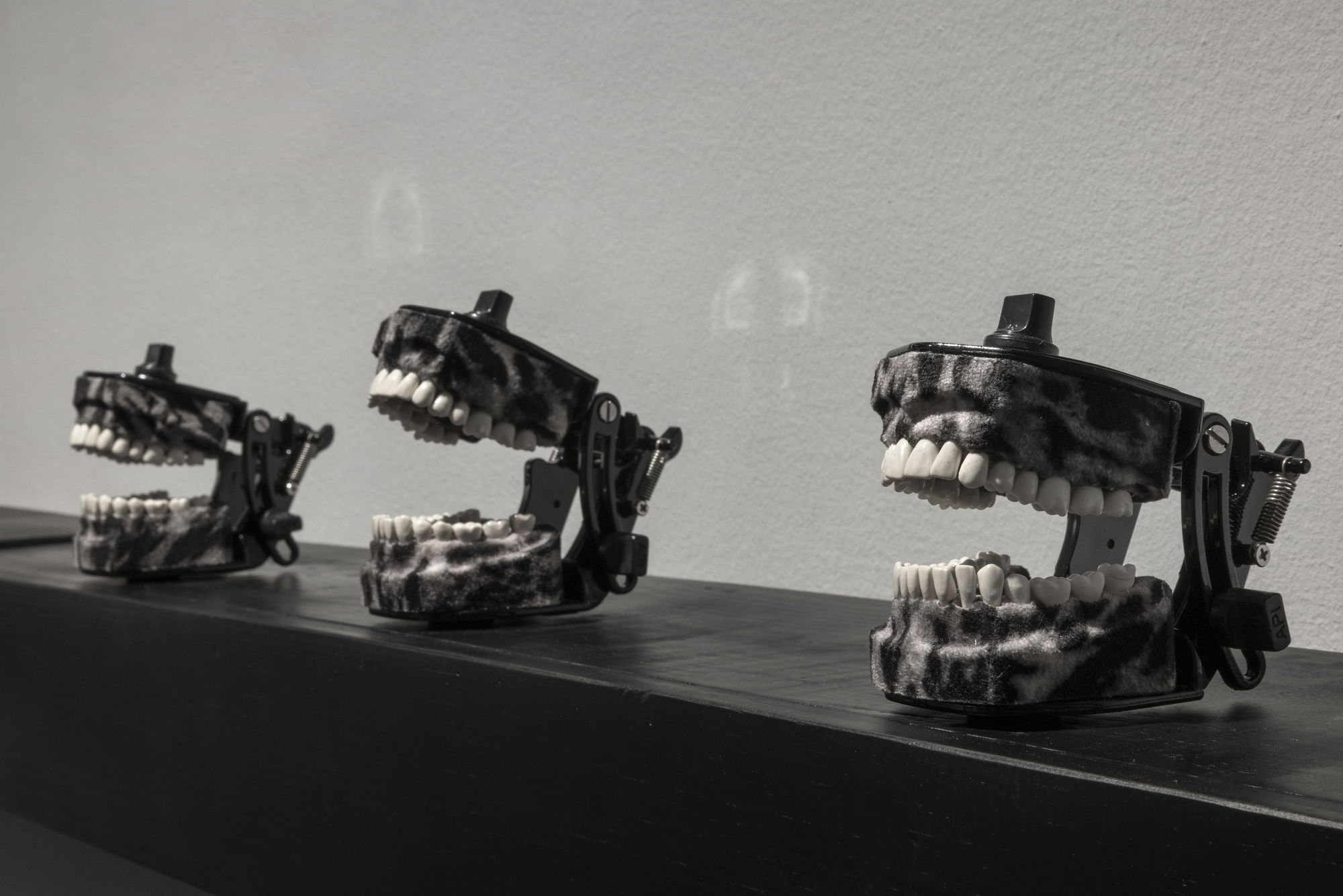 Anita Dube Foot Soldiers Wood, plastic, velvet, paint, glue, motor, power supply and wire