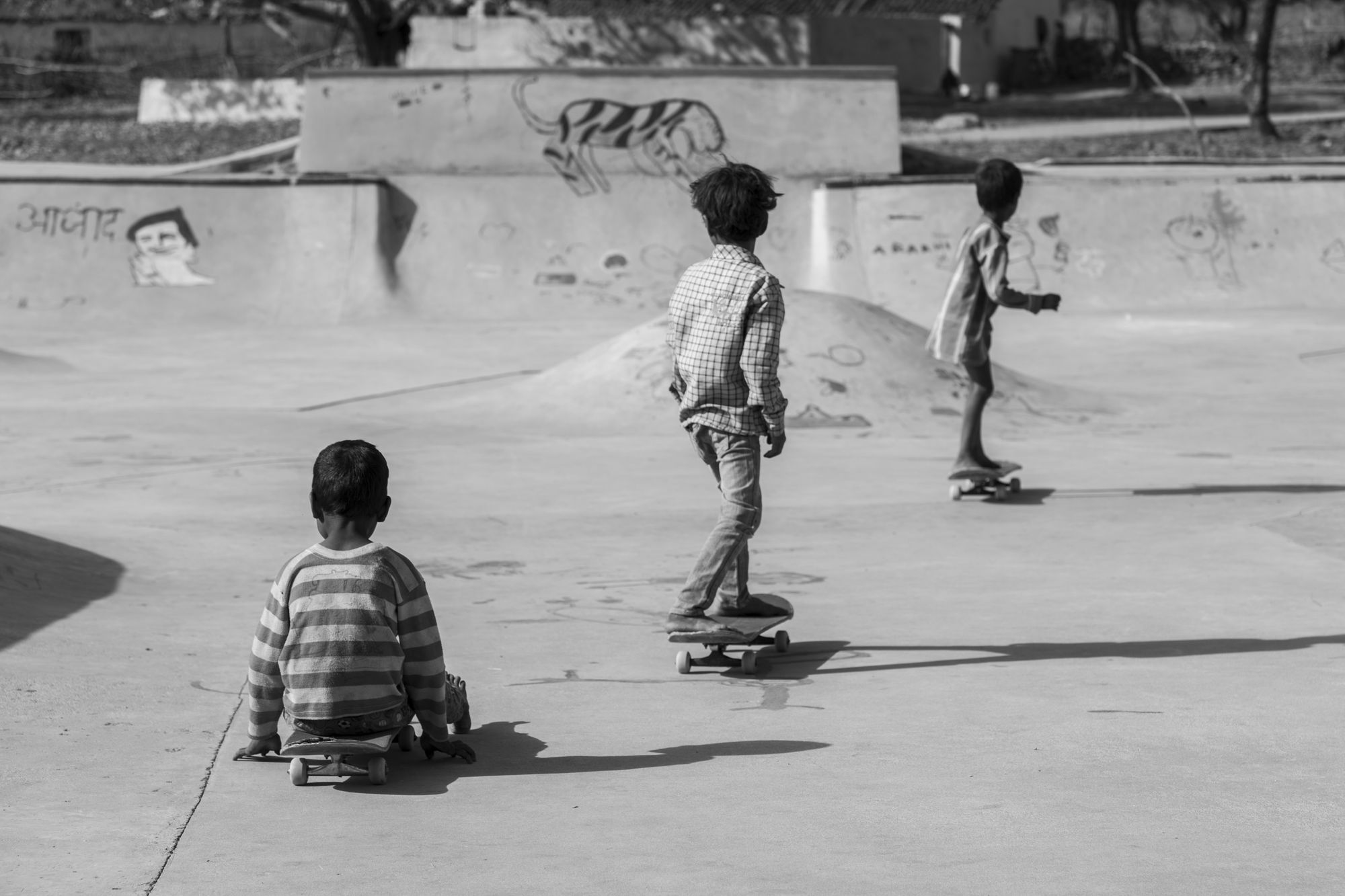 Vimal, 4 yrs, Brijesh, 5 yrs, Chootu, 6yrs, Janwaar Village, Madhya Pradesh, India (from the series Janwaar Castle) Archival pigment print 24 x 36 in