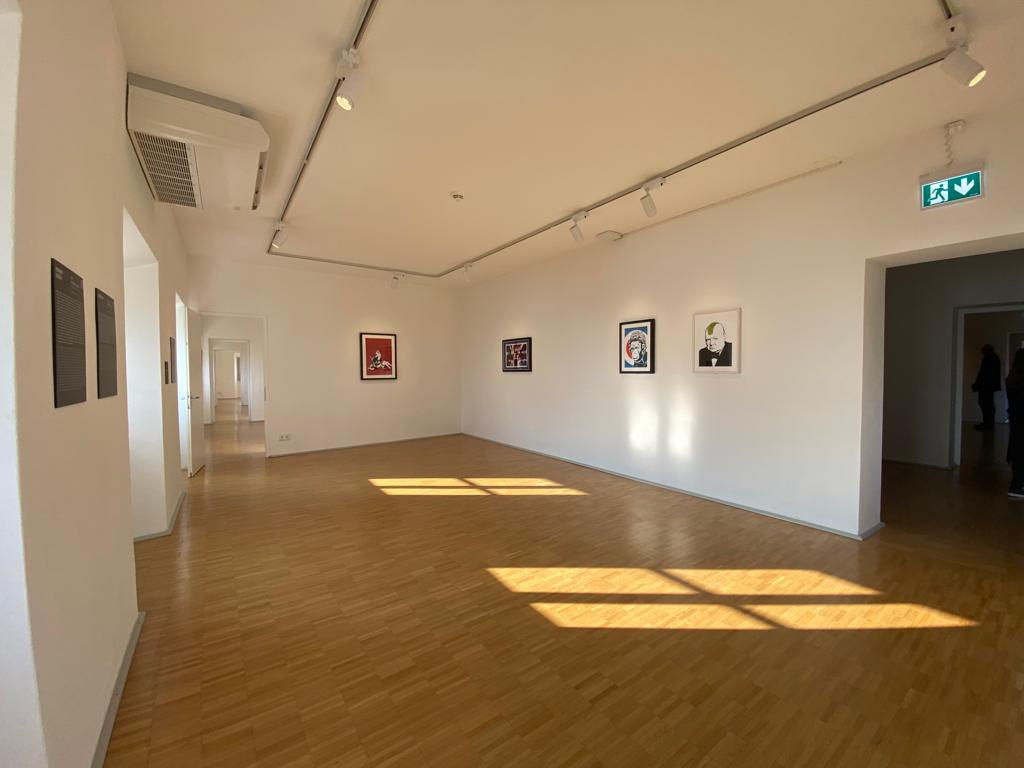 Banksy artworks hanging on wall