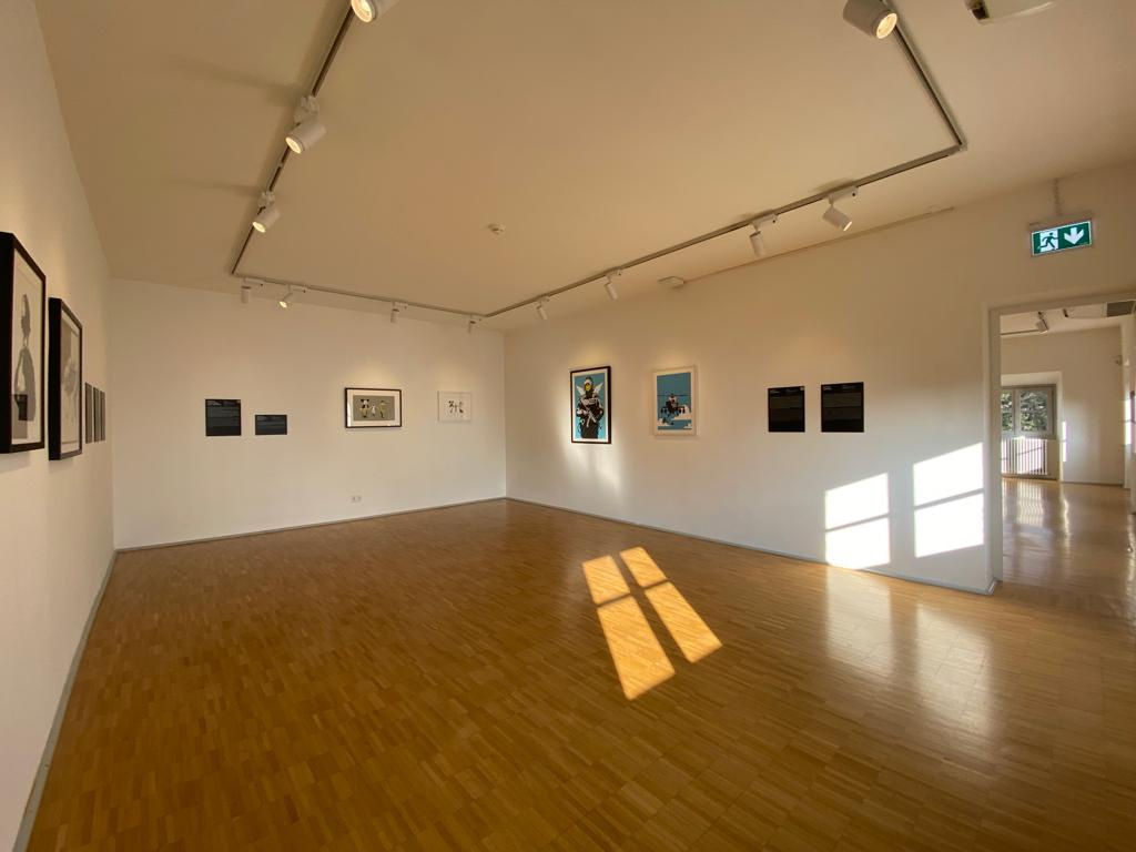 Banksy artworks hanging on wall