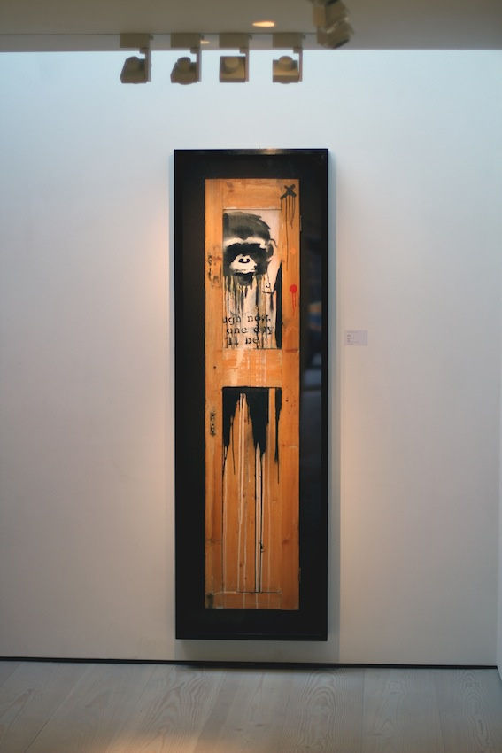 Banksy artworks hanging on wall