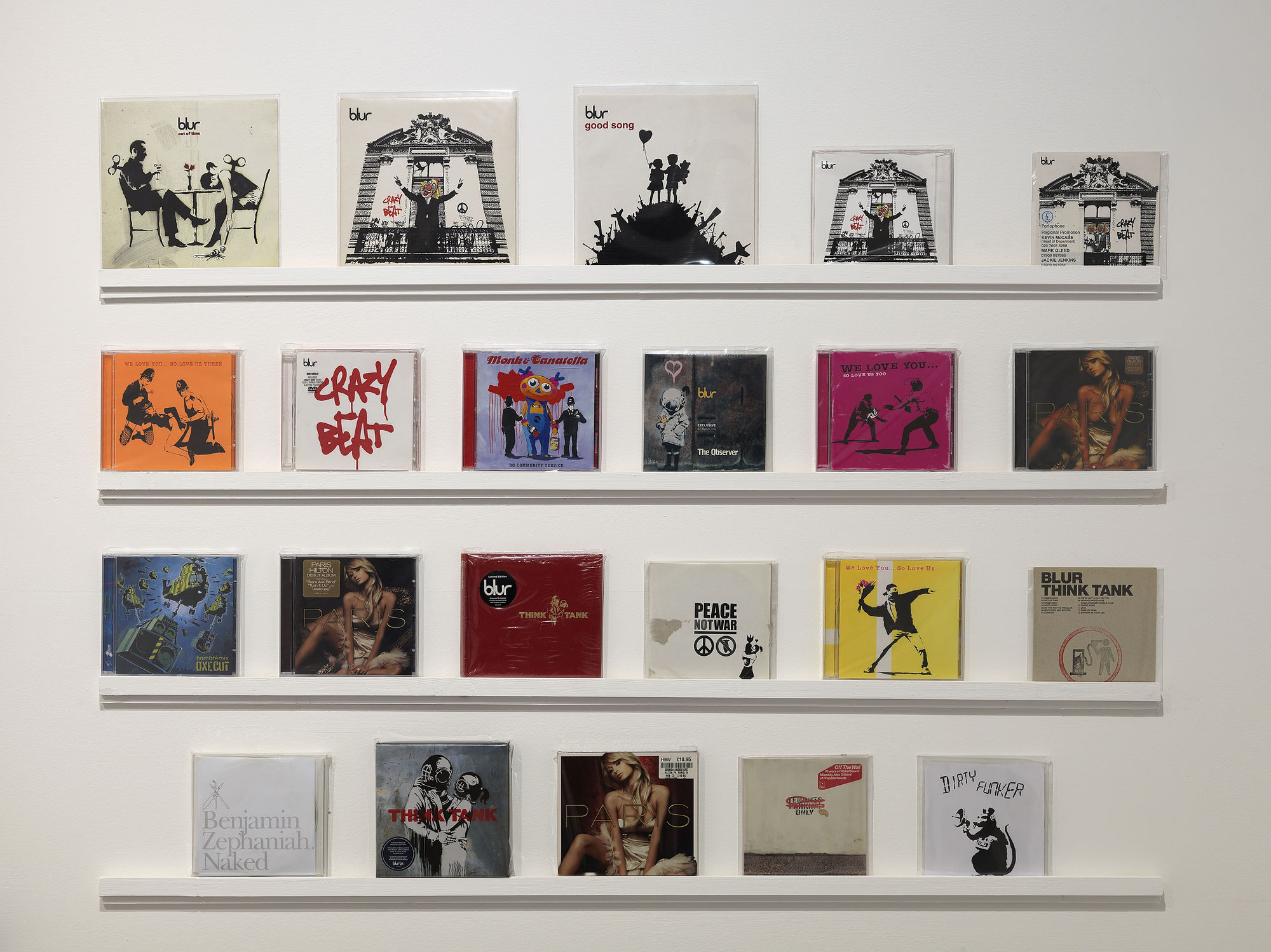 Banksy artworks hanging on wall