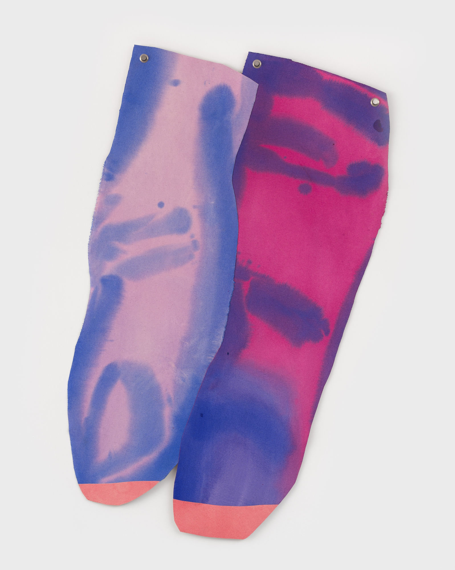 Two fingers cut out of canvas pointing downward, the left is a pale pink, the right is bright pink, both are outlined in blue.