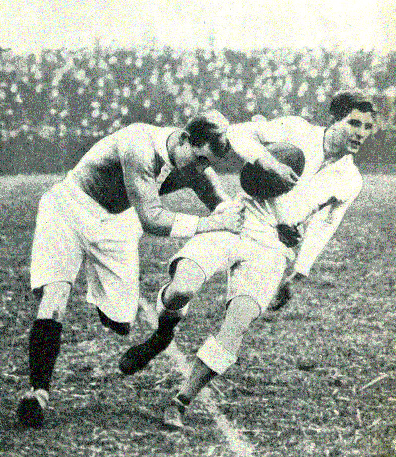 Cyril Lowe, England's record try scorer from 1920 to 1989, tackled by Dedet in 1913 vs France