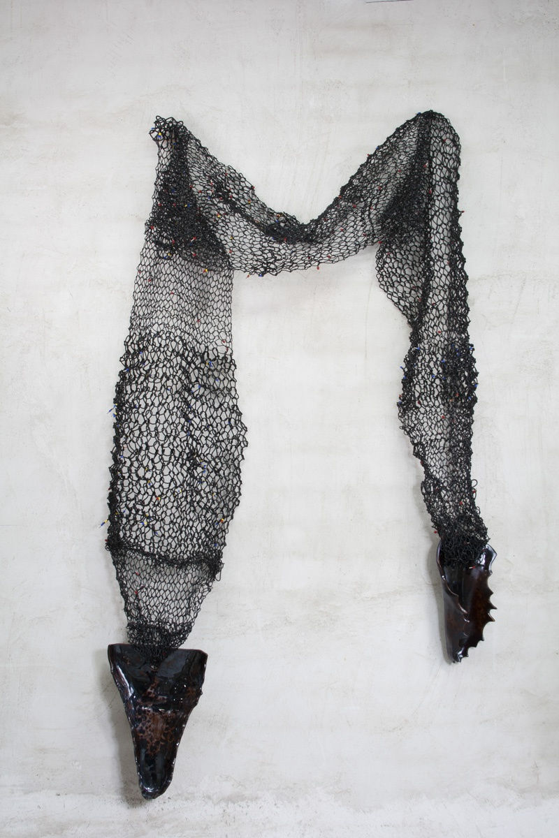El Mal En Ti Ii / The Evil In You Ii, 2018, Woven electrical wire, enameled ceramic, leather, 89” x 40” x 8"