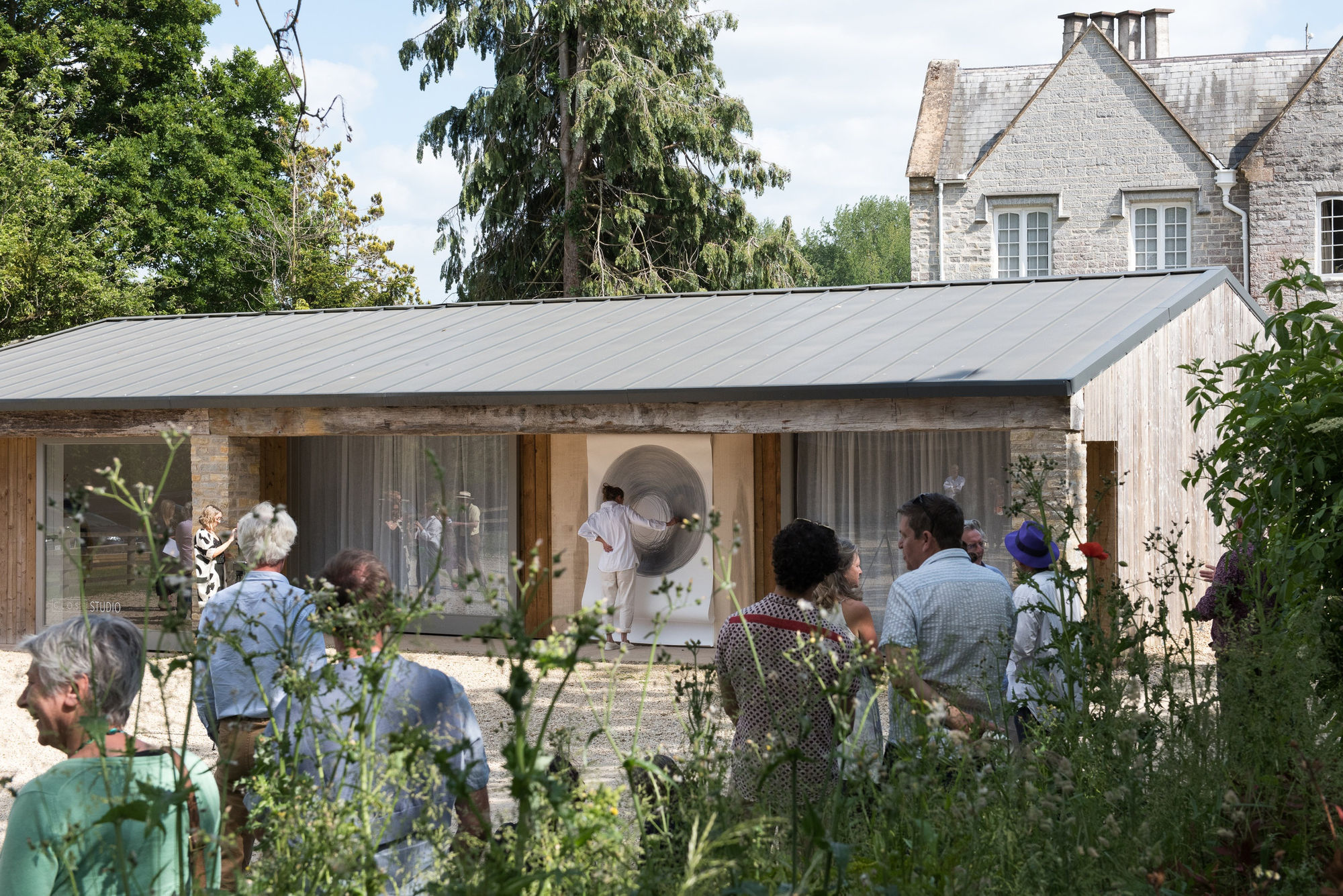 Creating a 'Circle Drawing' at the opening of 'Lines of Empathy', 3 June-22 July, 2023 at CLOSE Gallery.