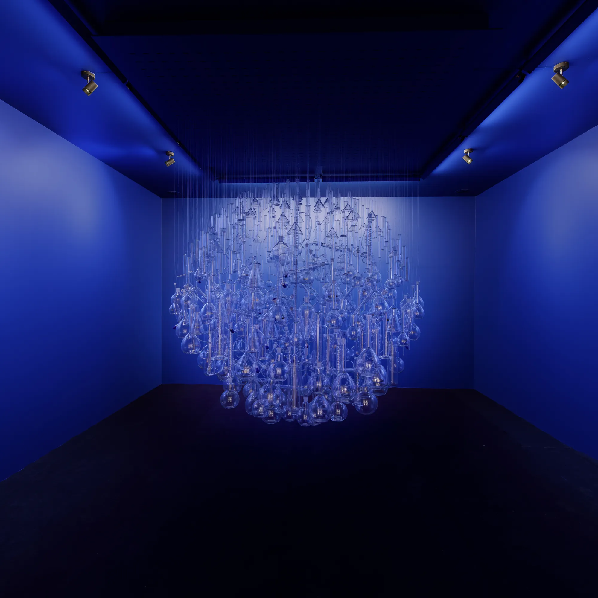 Sheba Chhachhi, ‘Ajab Karkhana’, Installation with approximately 600 pieces of laboratory glassware, with audio and video components, 72 × 72 × 72 in, 2023