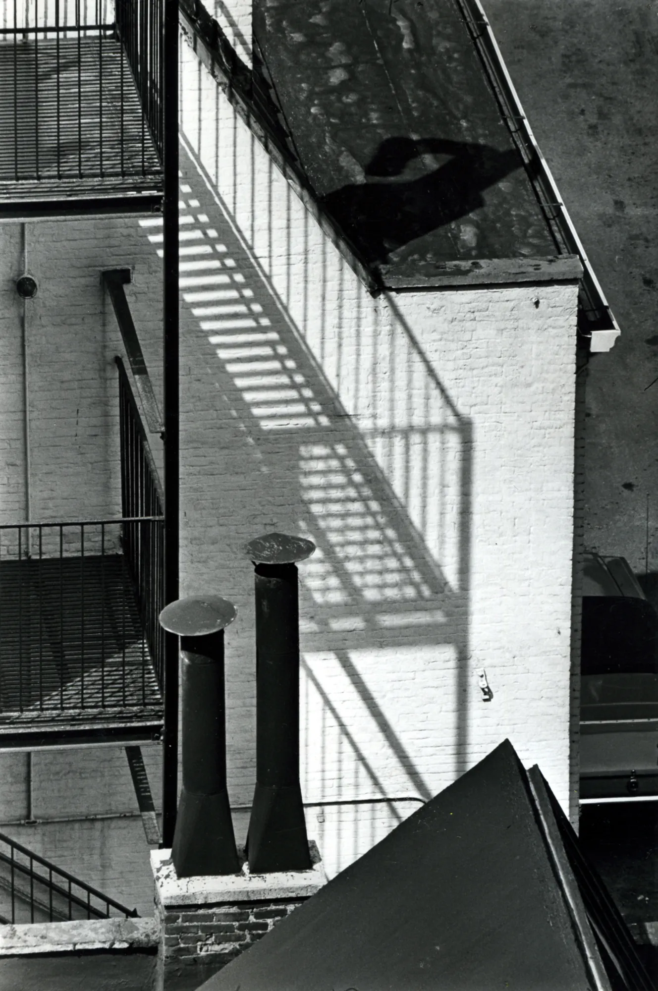 André Kertész (1894-1985) Chimney, MacDougal Alley, April 1st, 1965 Gelatin silver print, printed c. 1965 Stamped and dated 'April 1, 1965' on verso 10 x 8 in (25.4 x 20.3 cm)
