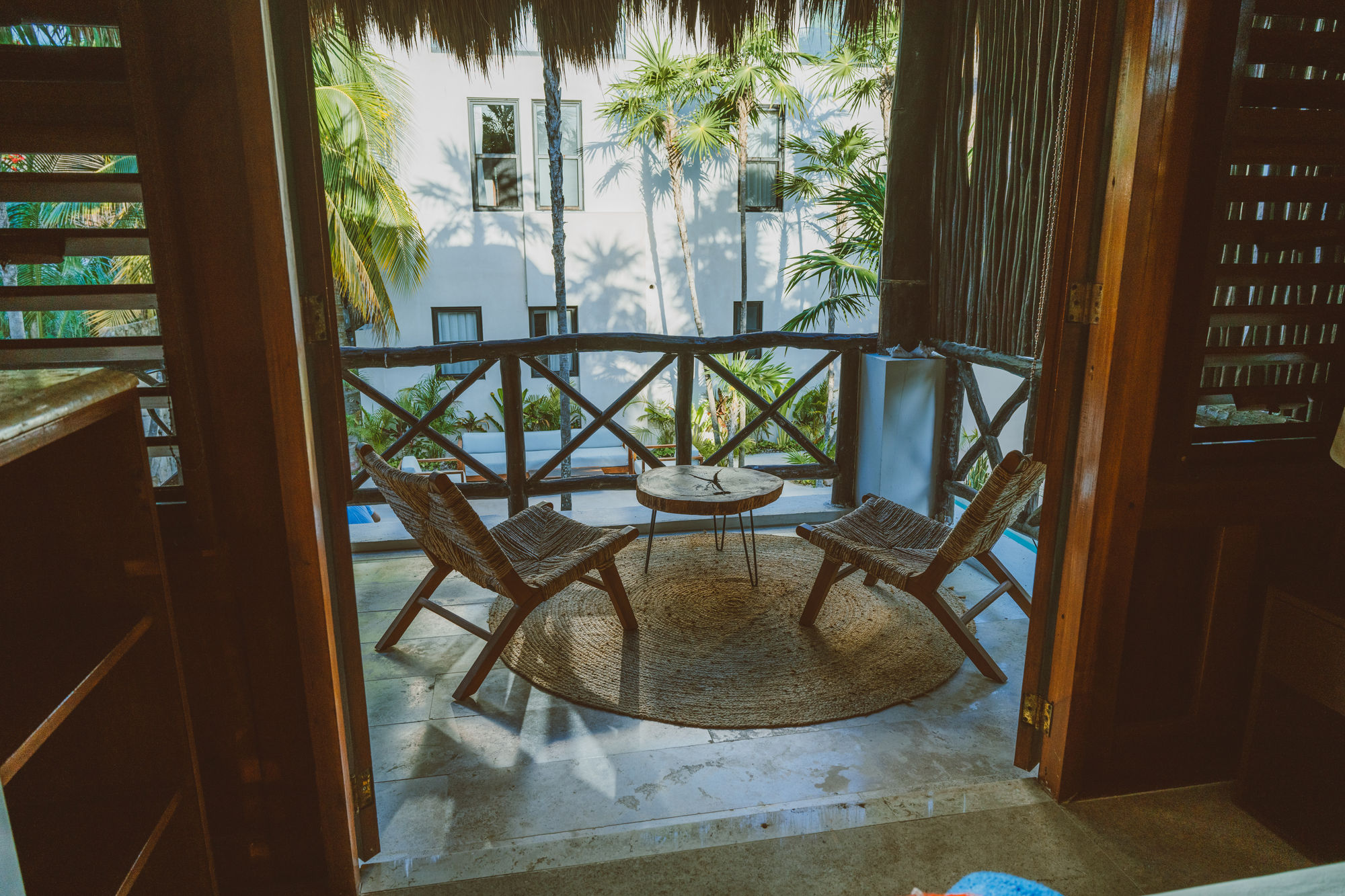 Casita balcony view out to courtyard & pool
