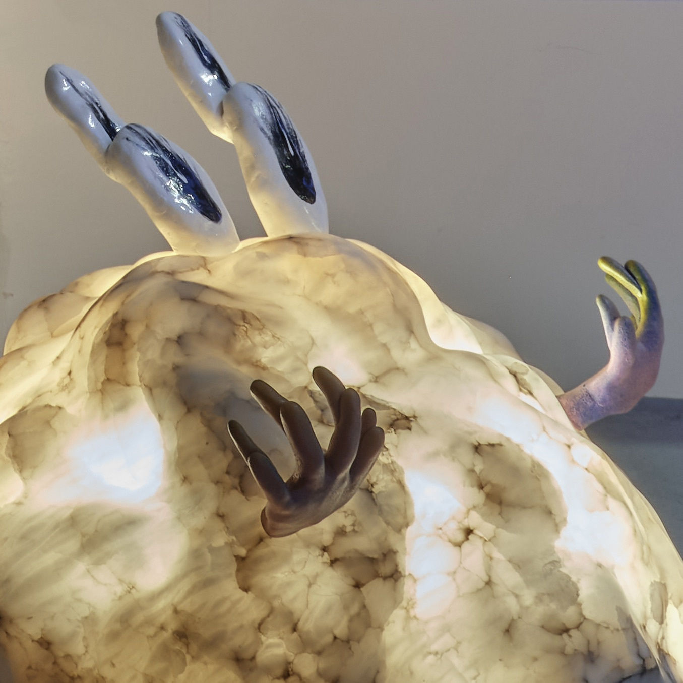 Detail, Backfire, 2023, alabaster, polymer clay, spray paint, LED, 35 x 40 x 35 cm