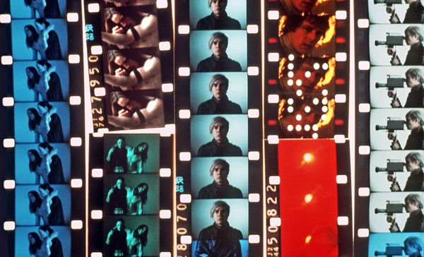 Color contact sheet with different iterations of images, some of which feature Andy Warhol