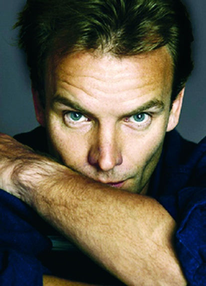 Color portrait photograph of Sting