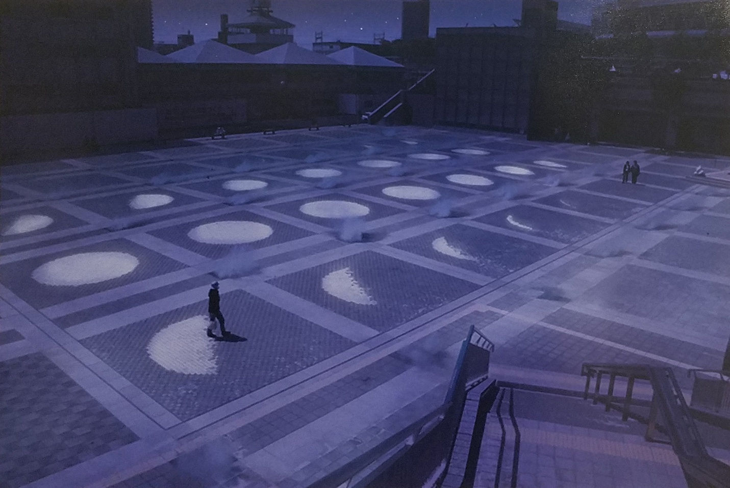 A photograph of a public artwork in a large open interior space