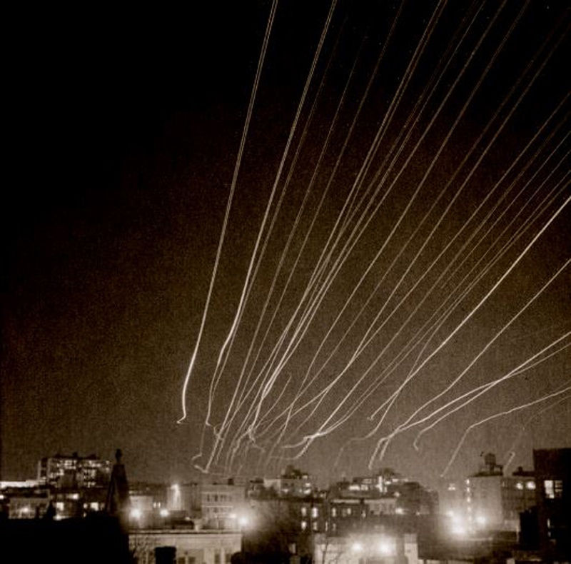 Long exposure photograph of lights streaming in the night sky