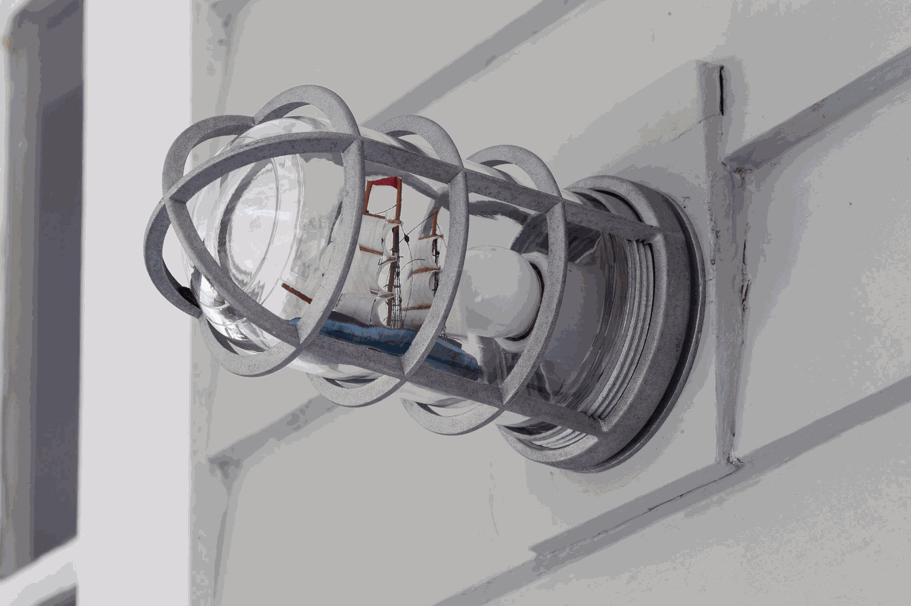Virginia Overton Untitled (Ship in a Bottle), 2013 security light fixture, bulb, and toy ship 7 x 4 x 4 inches
