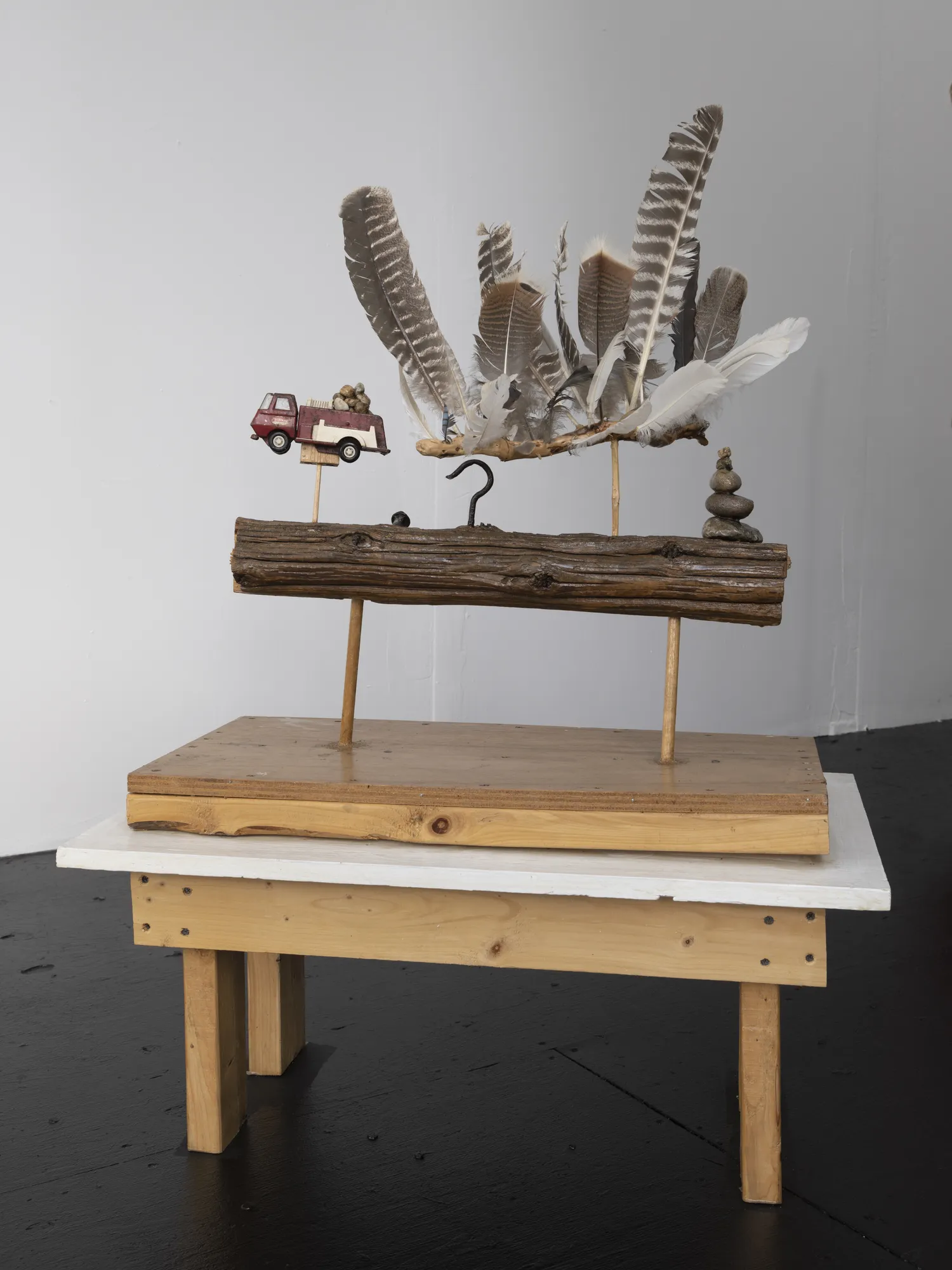 Arthur Simms Landscape, 2006 Feathers, toy truck, stones, metal, wood, paint, and bamboo 41 x 18 x 30 in 104.1 x 45.7 x 76.2 cm