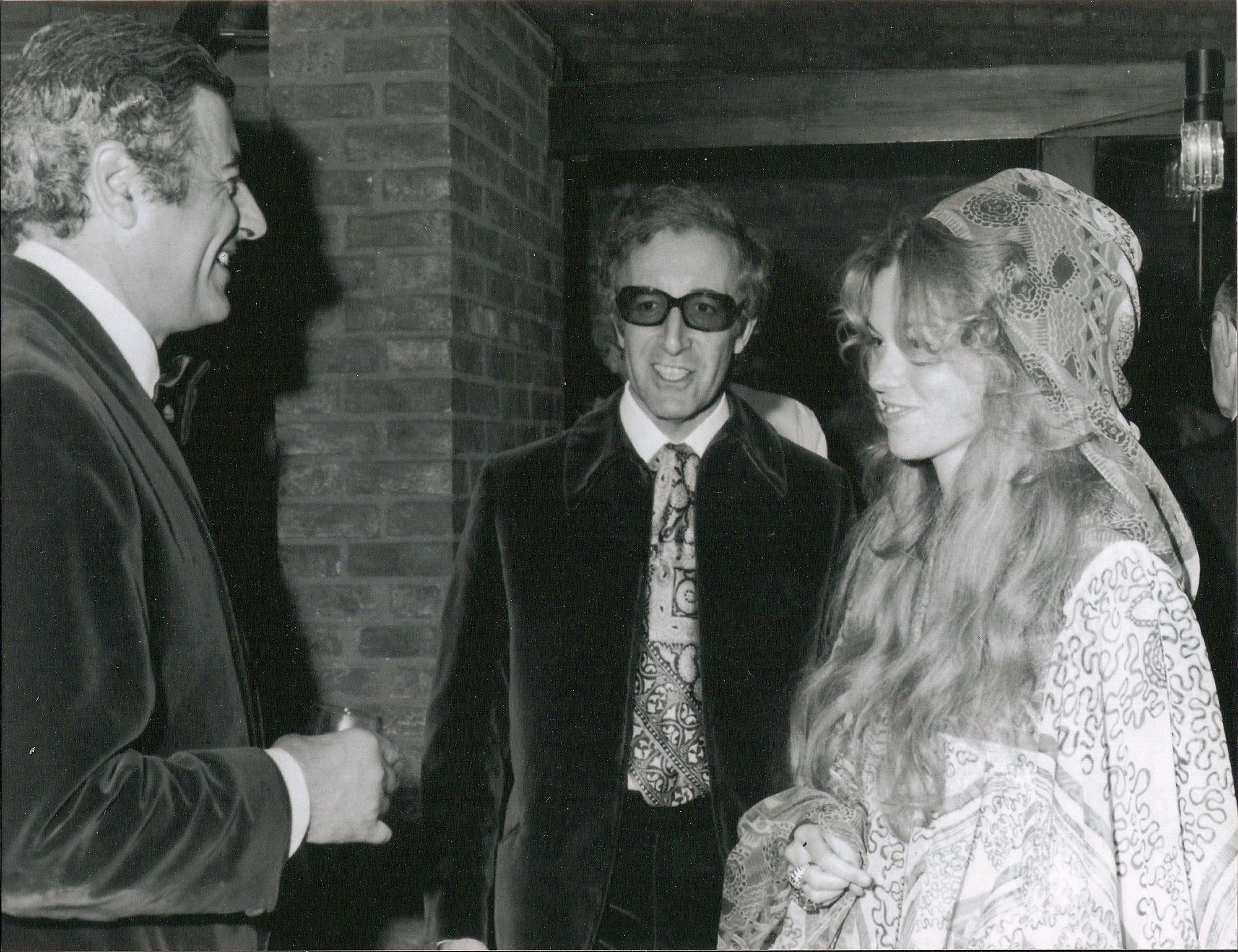 Andrew Grima with Peter Sellers and Miranda Quarry at a party in the Jermyn Street shop, Photograph by Desmond O'Neill