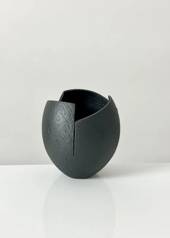 Ashraf Hanna, 5. Black cut and altered pinch pot I