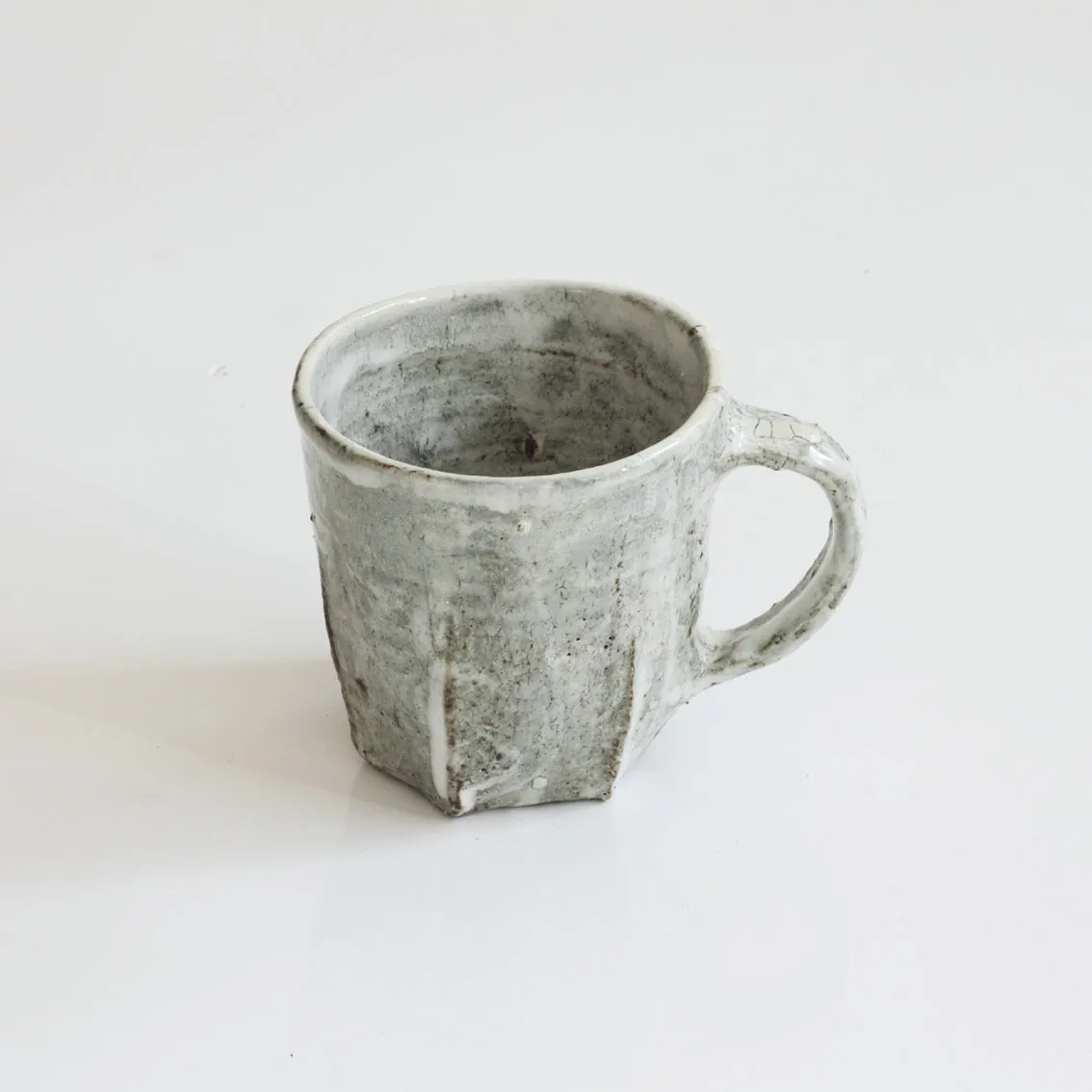 Akiko Hirai, 48. Grey Mug Pleats