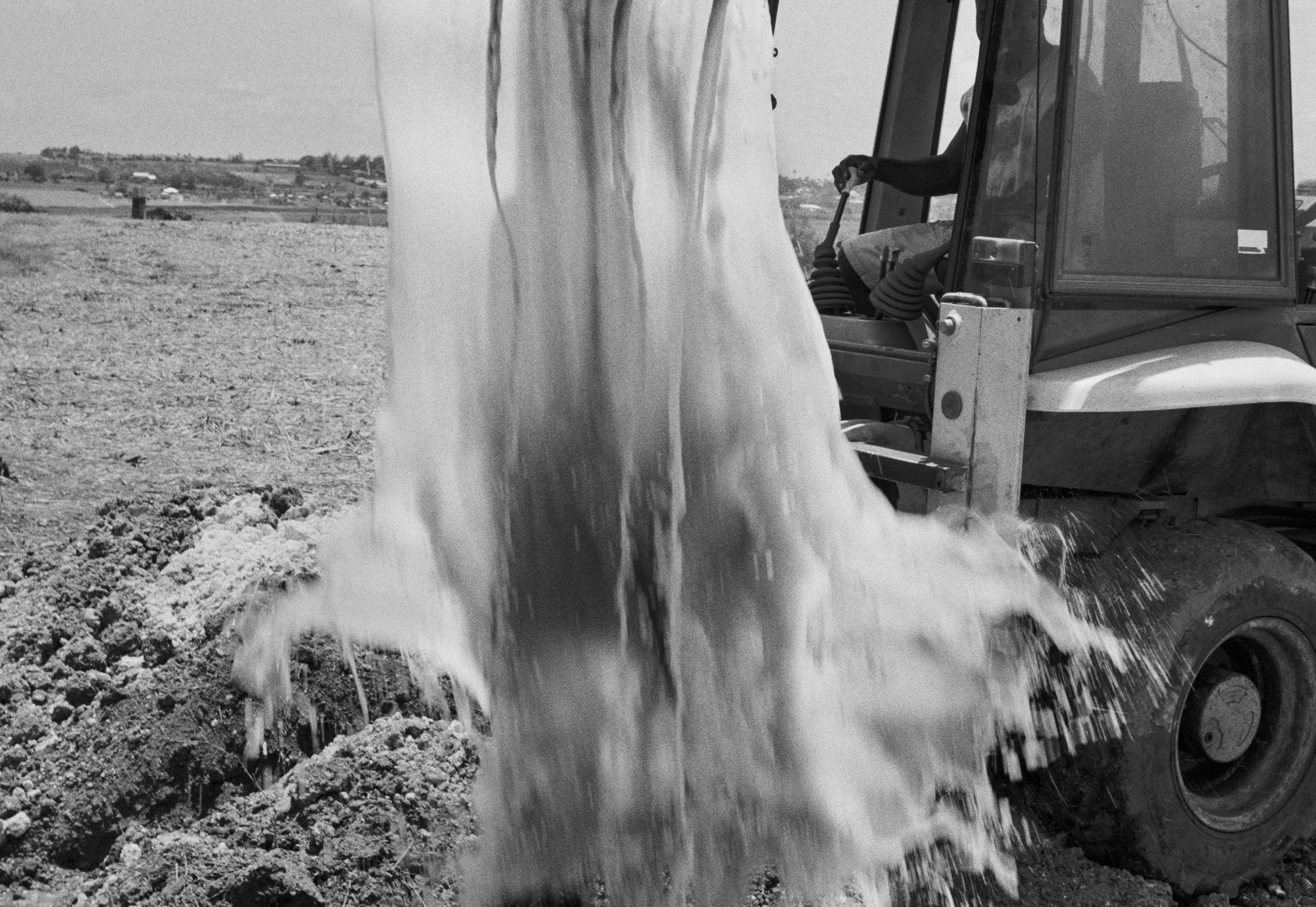 Repairing Broken Water Pipe, Brighton Farm, St. George, Barbados, 2010 Selenium Toned Silver Gelatin Print, 16x20" Archival Pigment Print on Moab Entrada Rag, 17x21" Edition of Three