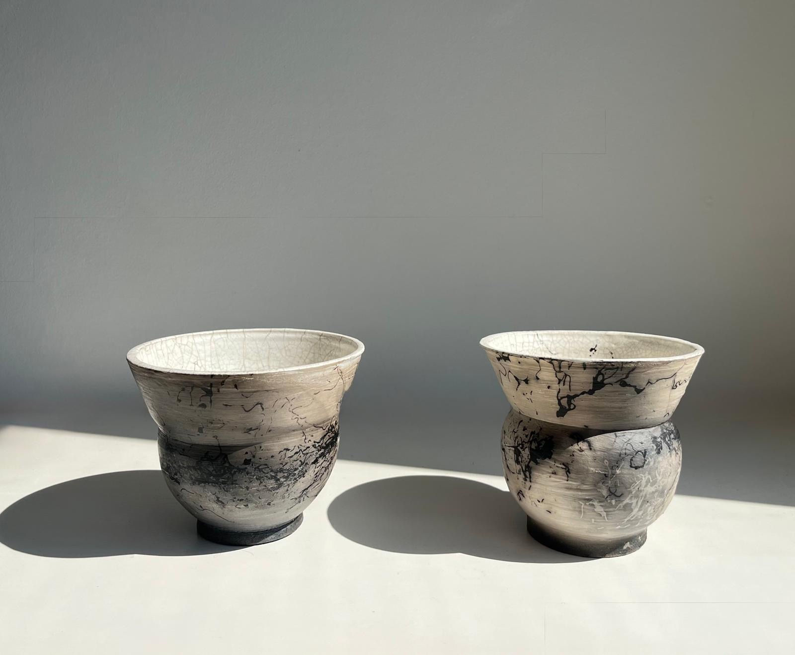 Violetta Papachristodoulou Horsehair Raku vases Stoneware and porcelain slip 12 cm h x 14 cm, each one. £475 - Set of two