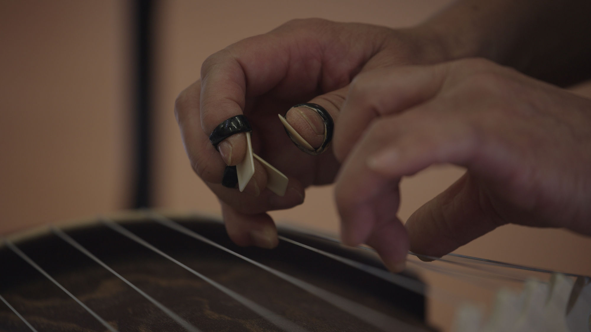 Overtone (video still), 2023, three-channel 4K video, color, stereo, 1 hour 24 min