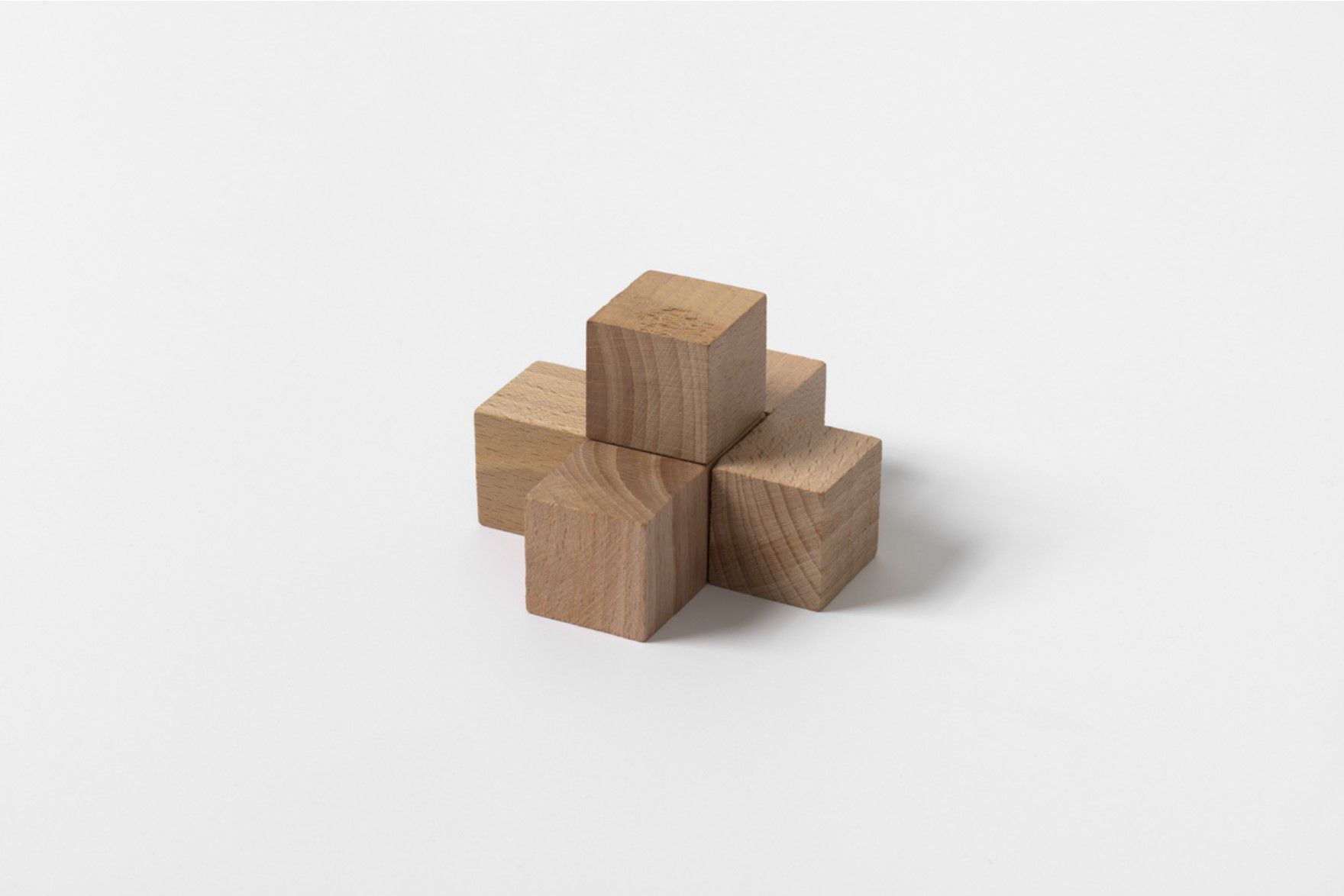 Carl Andre 6 Unit Wood Array, 2015 Wood 6-unit array; 1 cube atop a 5-unit cross Each: 1 1/8 x 1 1/8 x 1 1/8 in. (2.9 x 2.9 x 2.9 cm) Overall: 2 1/4 x 3 3/8 x 3 3/8 in. (5.7 x 8.6 x 8.6 cm)