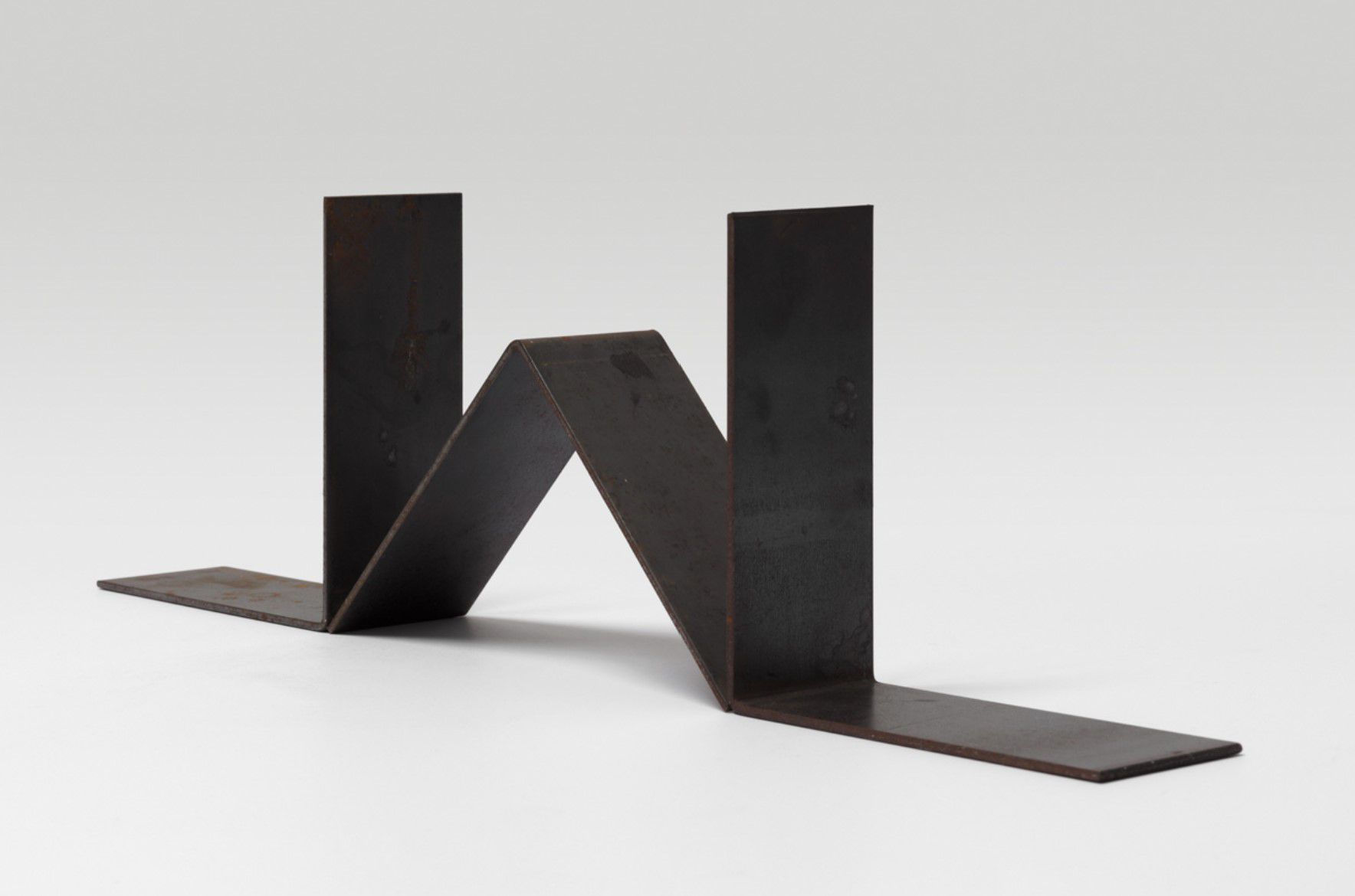 Carl Andre Three Part Steel Trip, 2019 3 Steel right angle units 6 x 6 x 2 3/8 inches (15.2 x 15.2 x 6 cm) Overall: 6 x 20 3/4 x 2 3/8 inches (15.2 x 52.7 x 6 cm)