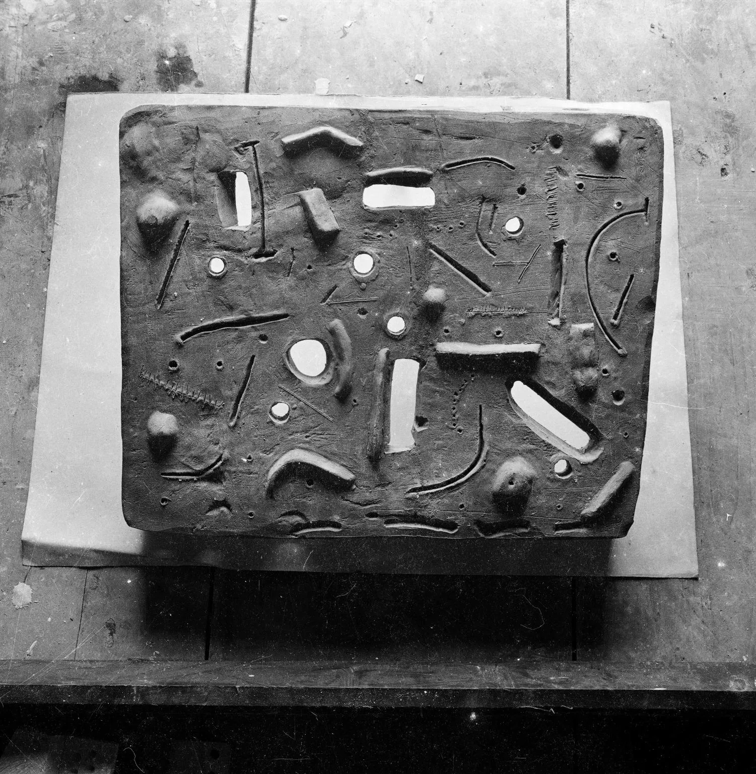 A contemproary photograph of the Relief taken by Nigel Henderson. The Eduardo Paolozzi Foundation. The Estate of Nigel Henderson. Tate Archive