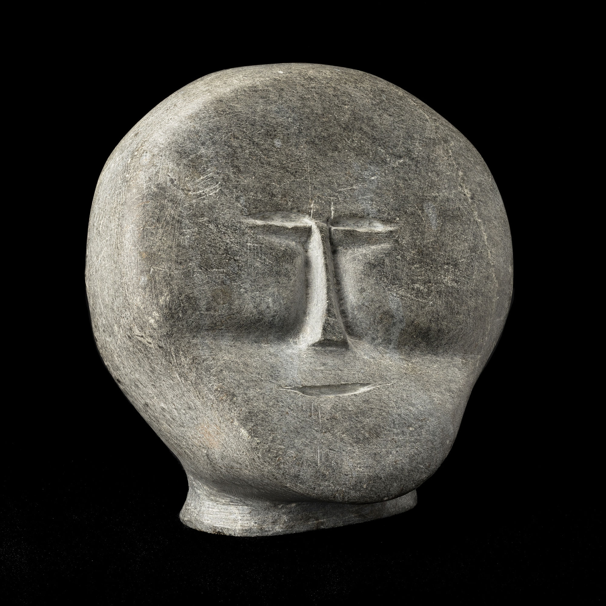 JOHN TIKTAK, R.C.A. (1916-1981) KANGIQLINIQ (RANKIN INLET) Head, c. 1965-6 REALIZED: $28,800
