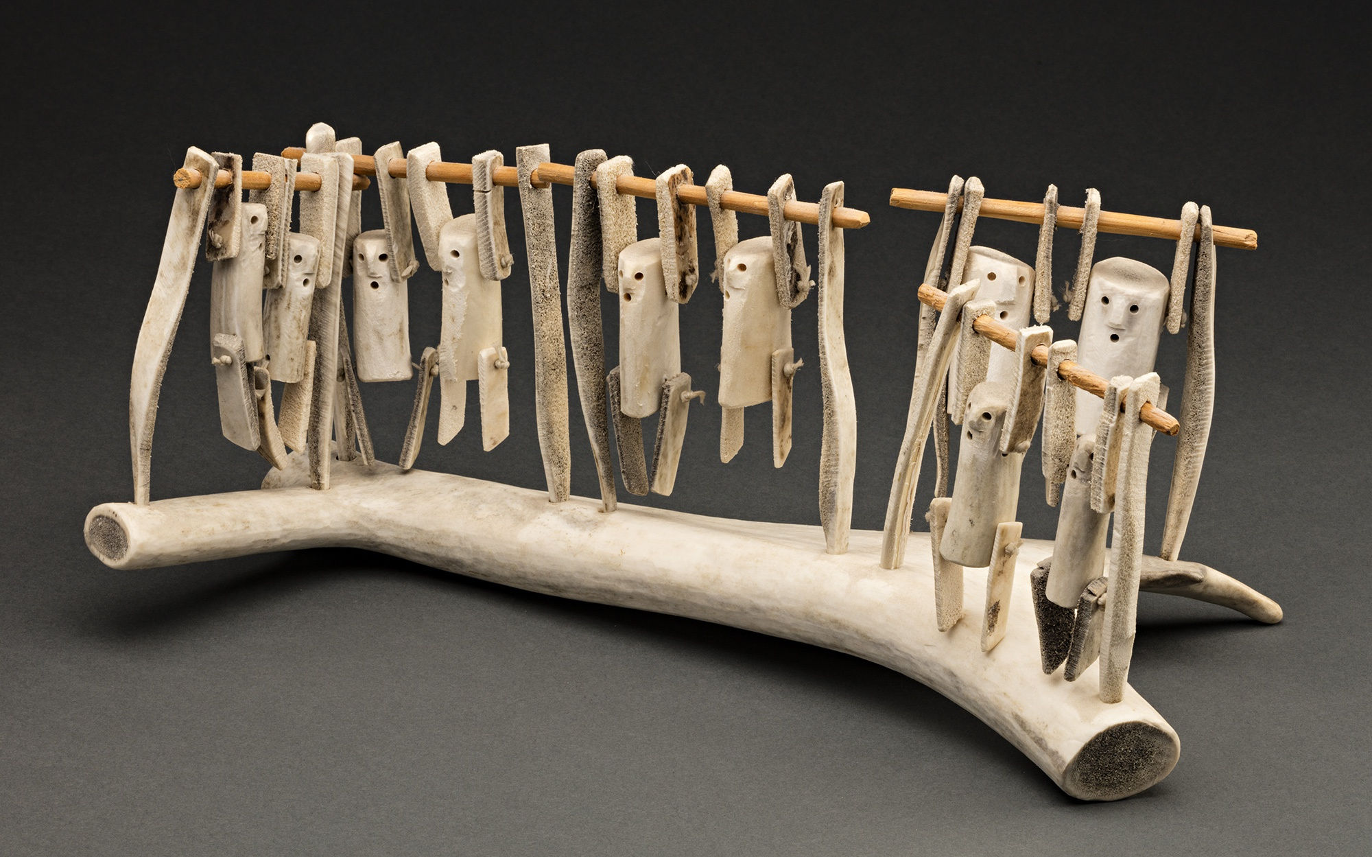 Lot 114 LUKE ANOWTALIK (1932-2006), ARVIAT (ESKIMO POINT) Acrobats, c. early 1990s antler, wood, and string, 7.75 x 16 x 8 in (19.7 x 40.6 x 20.3 cm) Estimate: $1,200⁠⁠⁠— $1,800 Price realized: $960