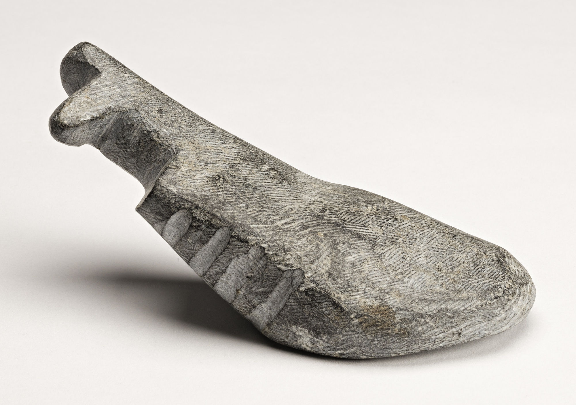 Lot 115 ANDY MIKI (1918-1983) ARVIAT (ESKIMO POINT) Reclining Animal, early-mid 1970s stone, 2.25 x 5.5 x 2 in (5.7 x 14 x 5.1 cm) Estimate: $1,800⁠⁠⁠— $2,800 price realized: $3,600