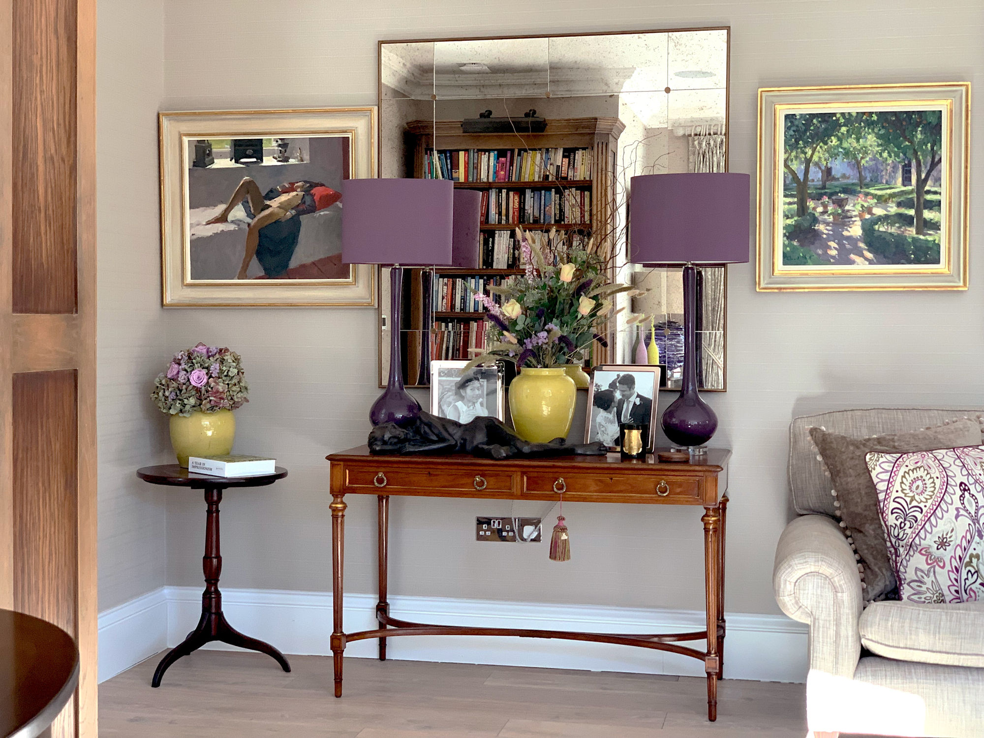 A cohesive interior with plenty of interest and lifted by these two original oil paintings by Ken Howard and Edward Noott